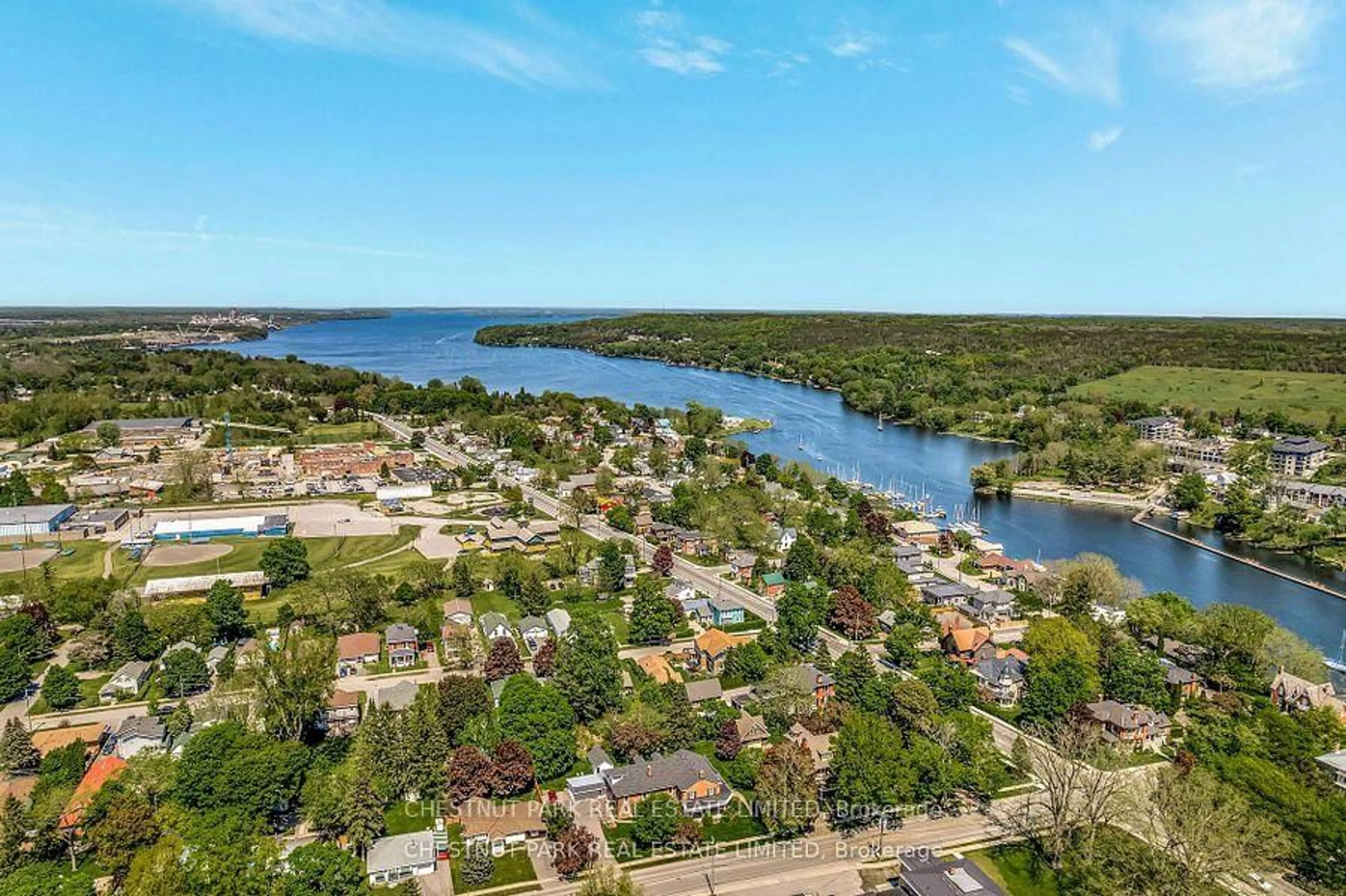 A pic from outside/outdoor area/front of a property/back of a property/a pic from drone, water/lake/river/ocean view for 4 Bridge St #7, Prince Edward County Ontario K0K 2T0