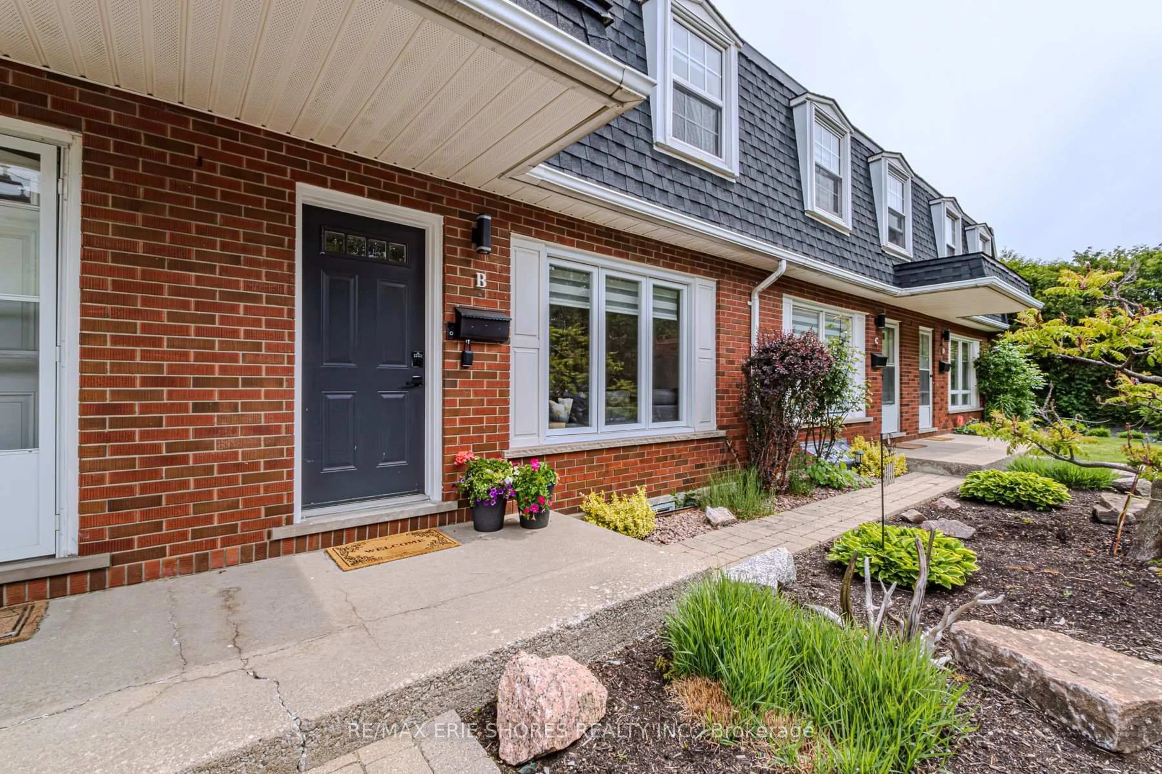 Home with brick exterior material, street for 69 Mount Albion Rd #B, Hamilton Ontario L8K 5S5