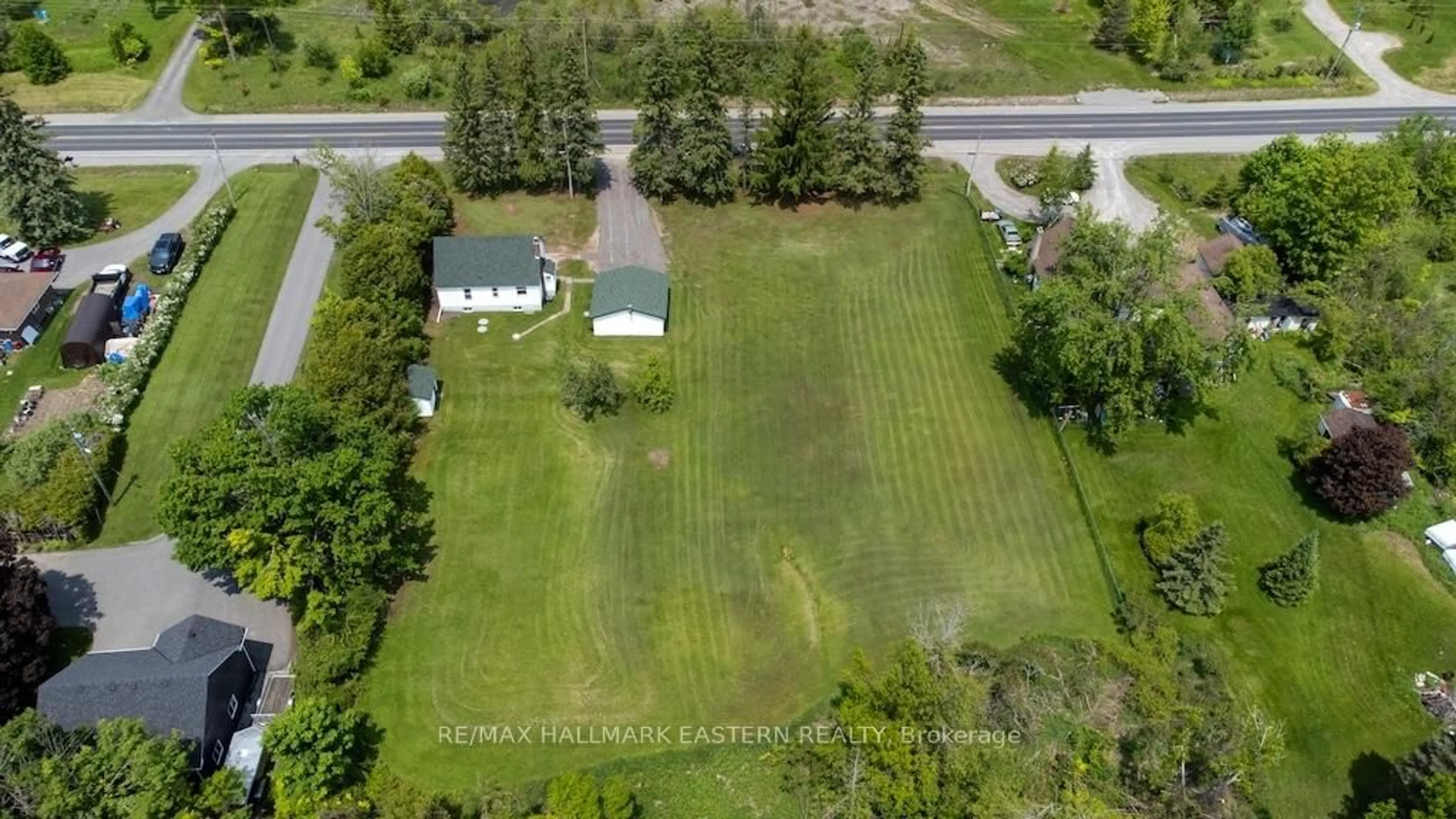A pic from outside/outdoor area/front of a property/back of a property/a pic from drone, unknown for 2449 Lansdowne St, Cavan Monaghan Ontario K9J 6X4