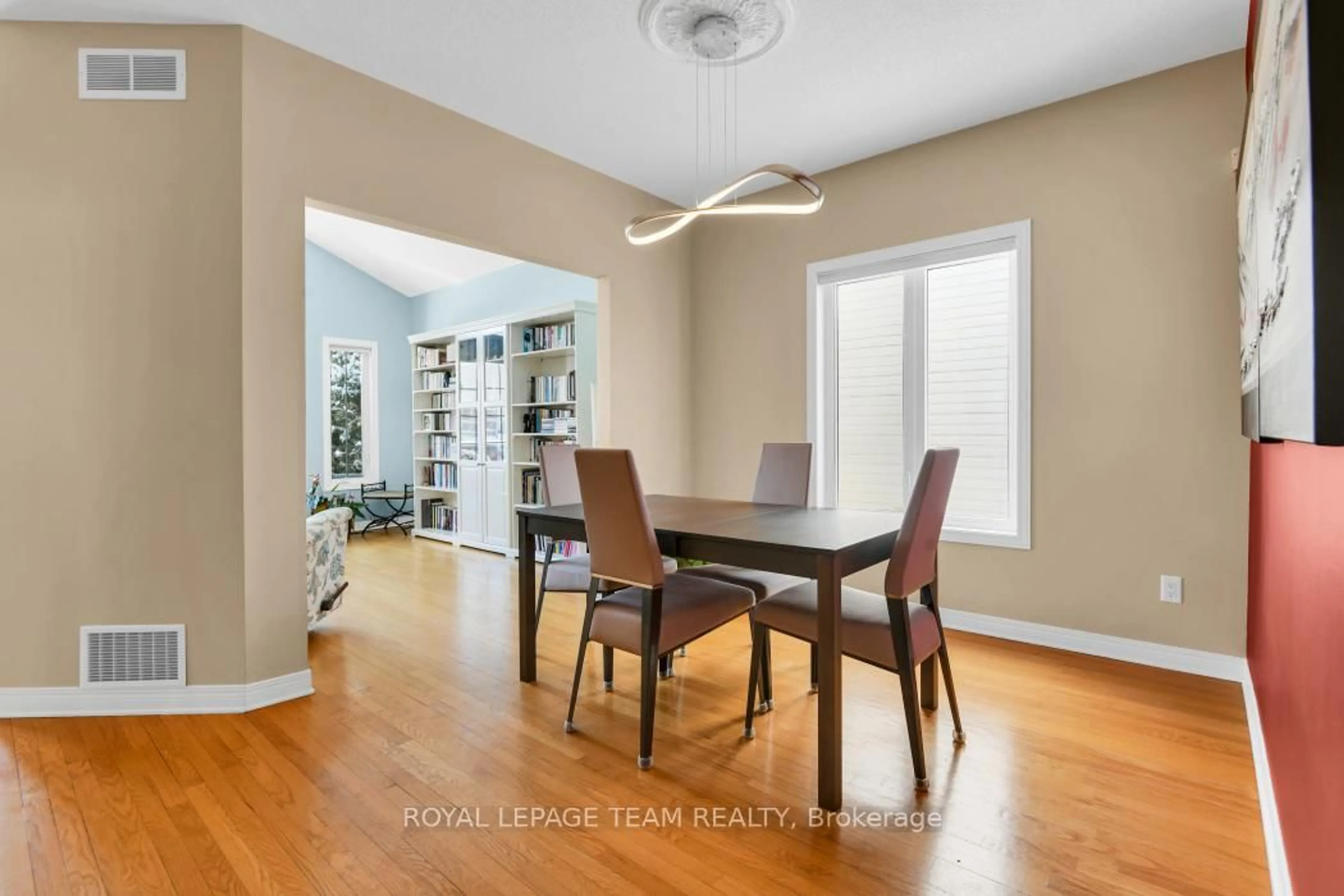 Dining room, wood/laminate floor for 1581 Belleterre St, Orleans Ontario K1C 7N5