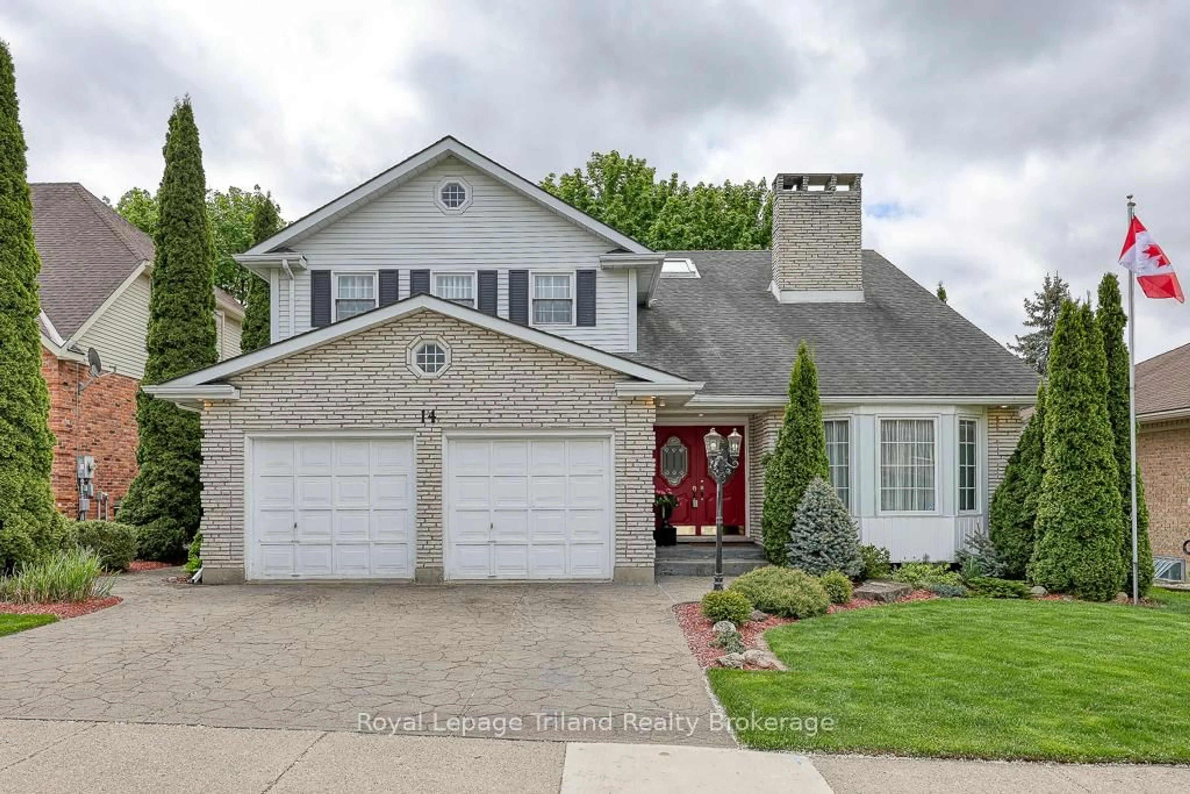 Home with brick exterior material, street for 14 Blackfoot Pl, Woodstock Ontario N4T 1E2