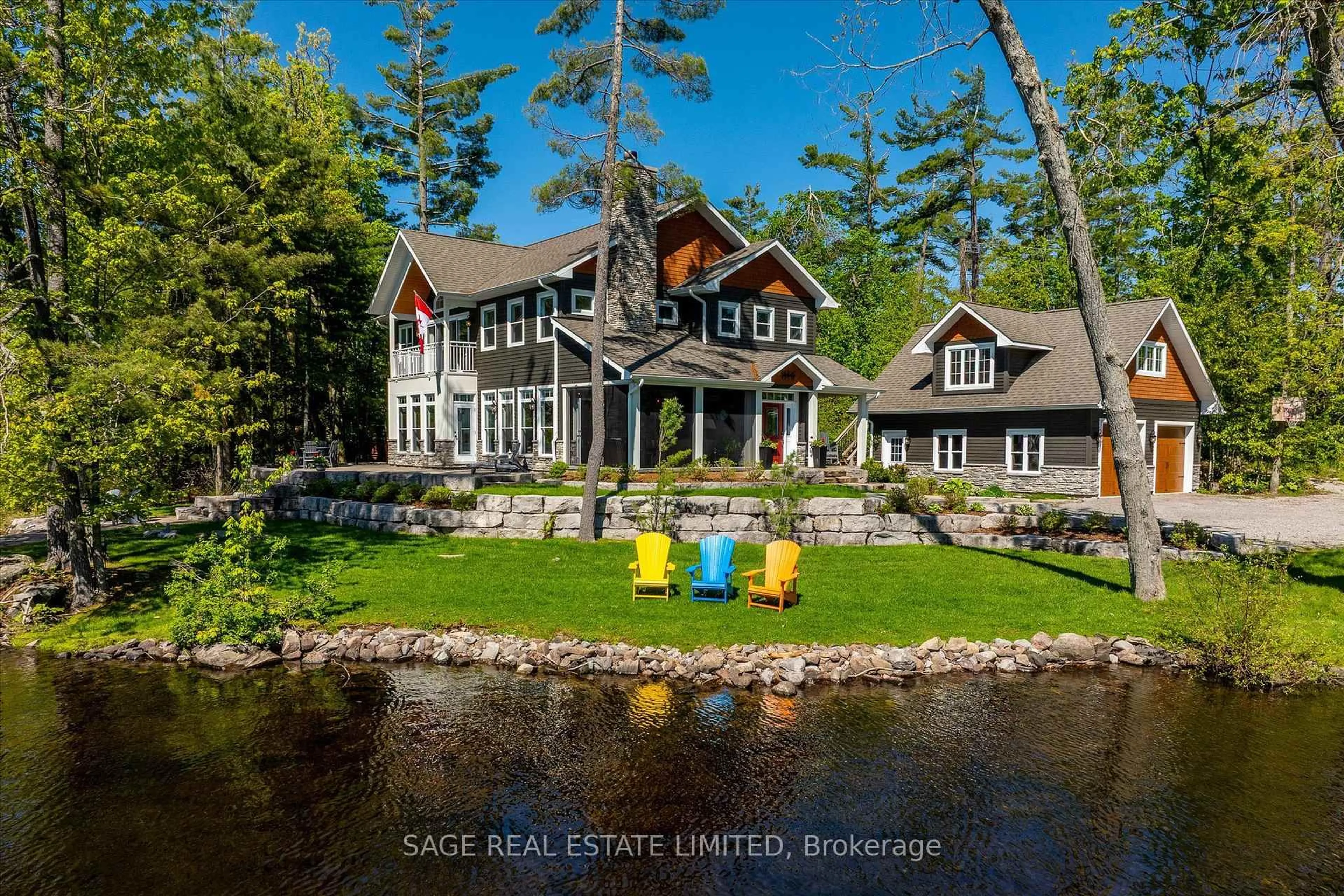 A pic from outside/outdoor area/front of a property/back of a property/a pic from drone, water/lake/river/ocean view for 51 Fire Route 96D, Trent Lakes Ontario K0M 1A0