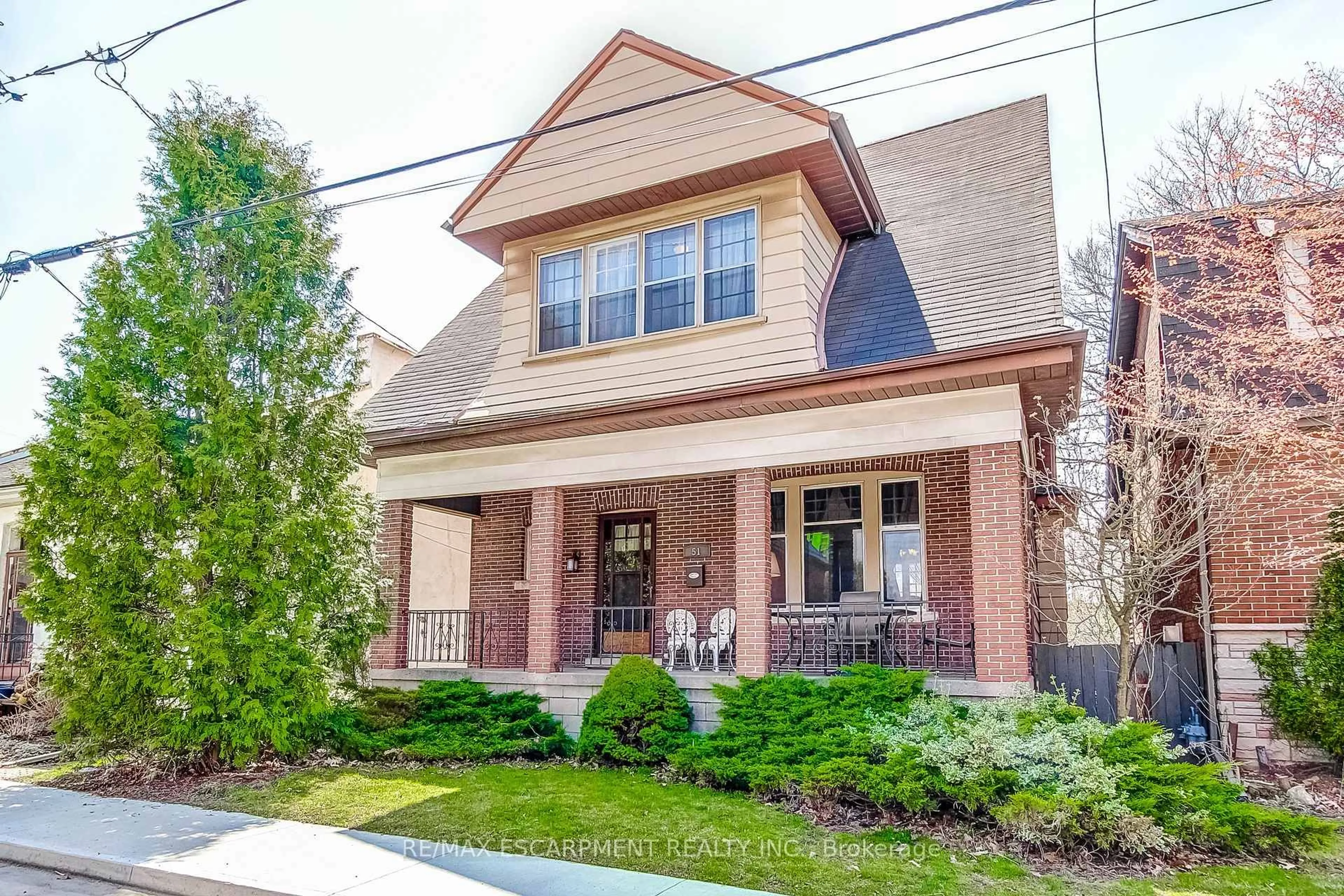 Home with brick exterior material, street for 51 Canada St, Hamilton Ontario L8P 1P1