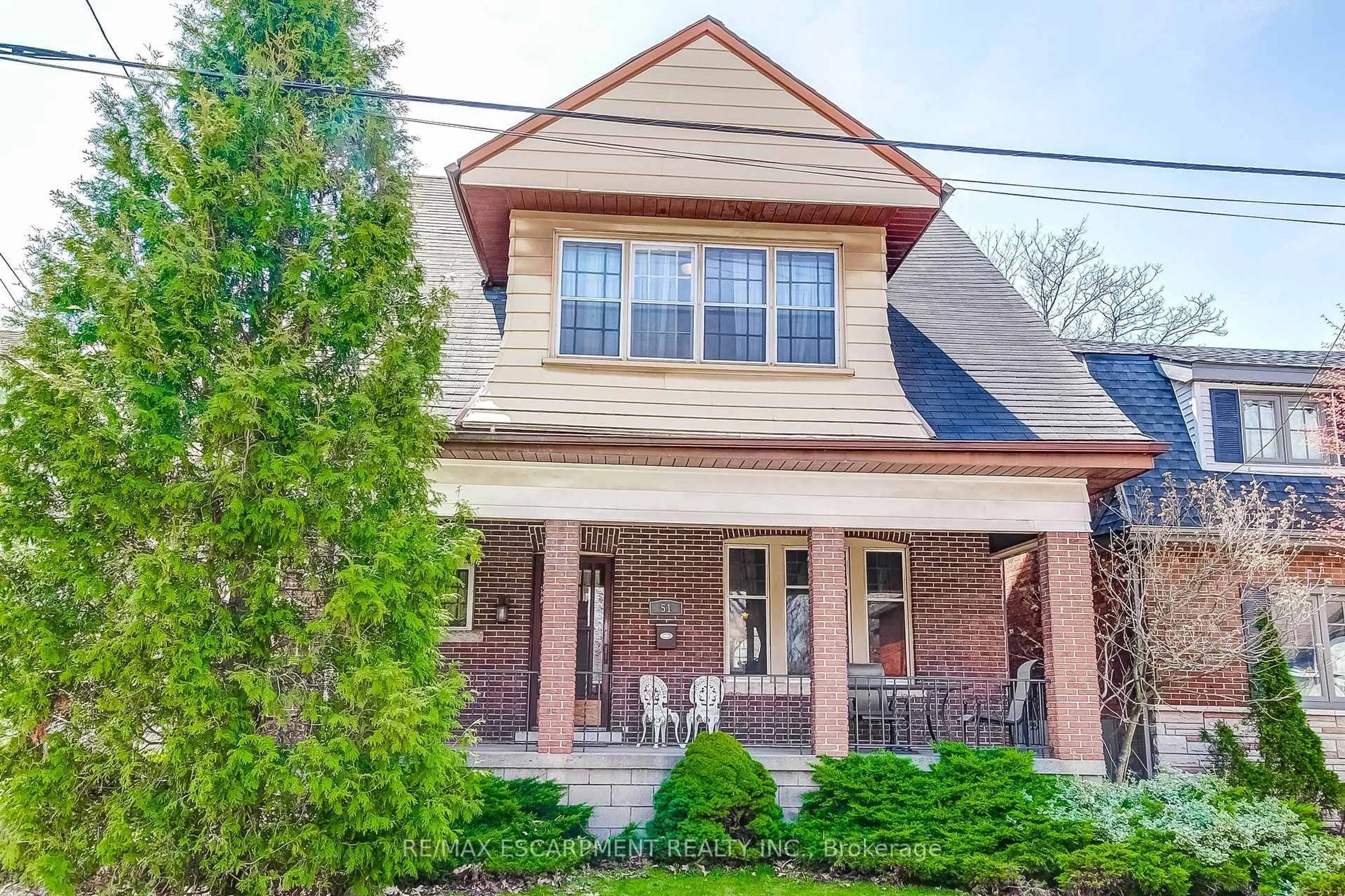 Home with brick exterior material, street for 51 Canada St, Hamilton Ontario L8P 1P1