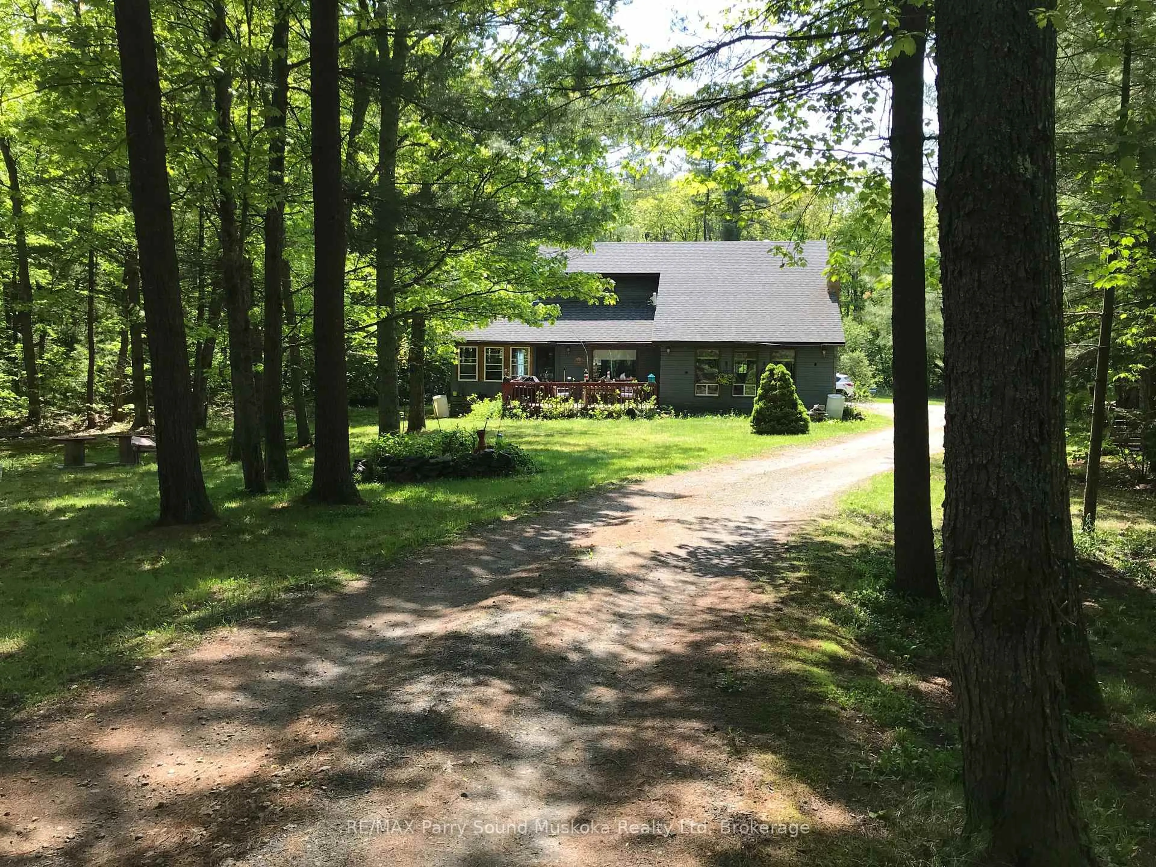 A pic from outside/outdoor area/front of a property/back of a property/a pic from drone, forest/trees view for 36 Windfall Lake Rd, Seguin Ontario P2A 0B2