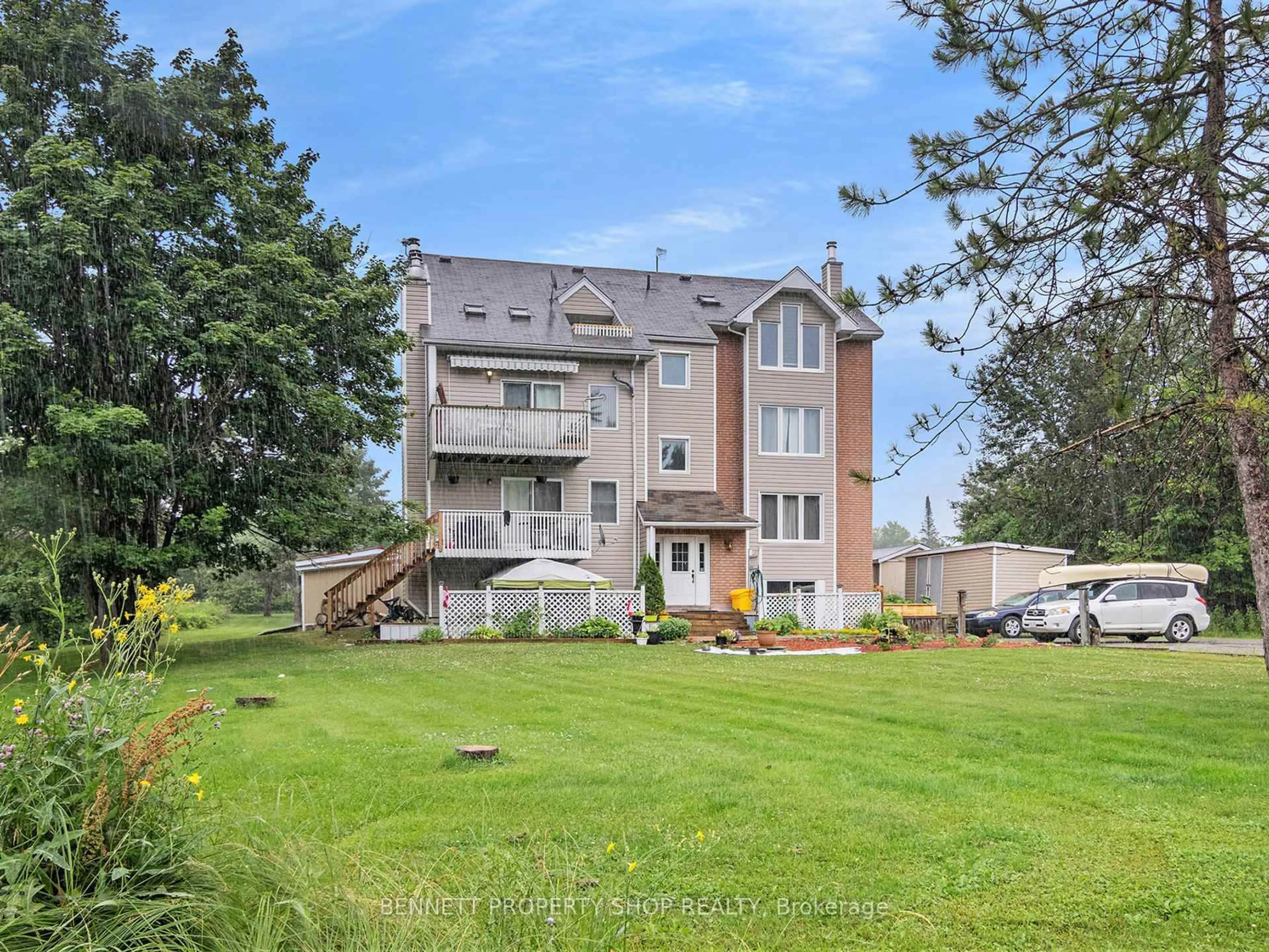 A pic from outside/outdoor area/front of a property/back of a property/a pic from drone, water/lake/river/ocean view for 1036 Barryvale Rd #4D, Calabogie Ontario K0J 1H0