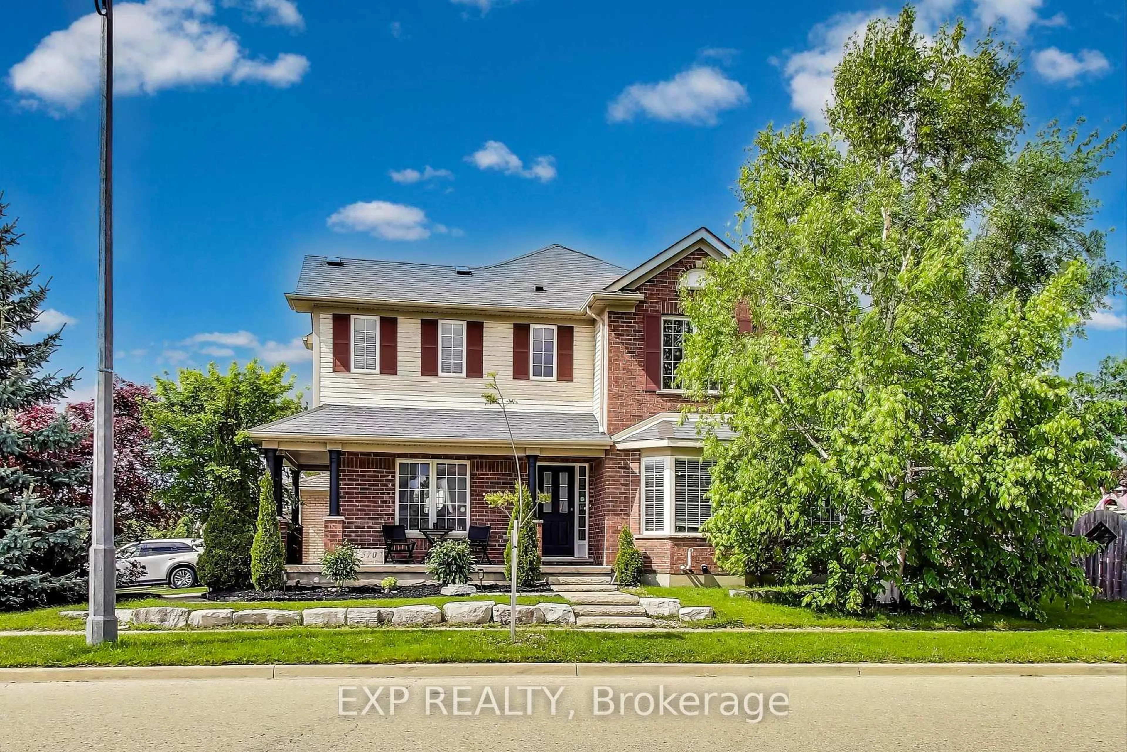 Home with brick exterior material, street for 570 New Bedford Dr, Waterloo Ontario N2K 4M7