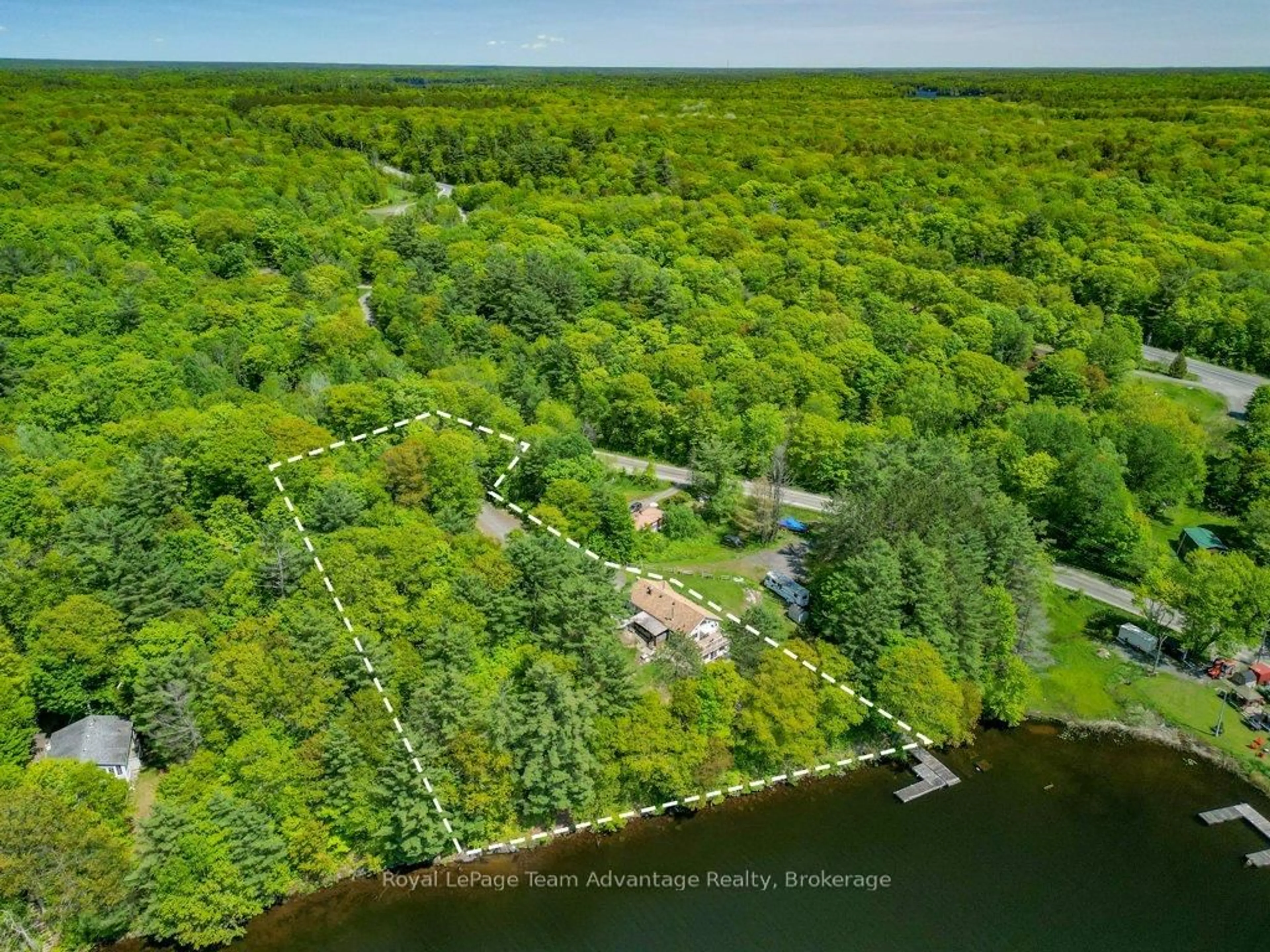 A pic from outside/outdoor area/front of a property/back of a property/a pic from drone, water/lake/river/ocean view for 19 Allan Cres, Seguin Ontario P2A 2W8
