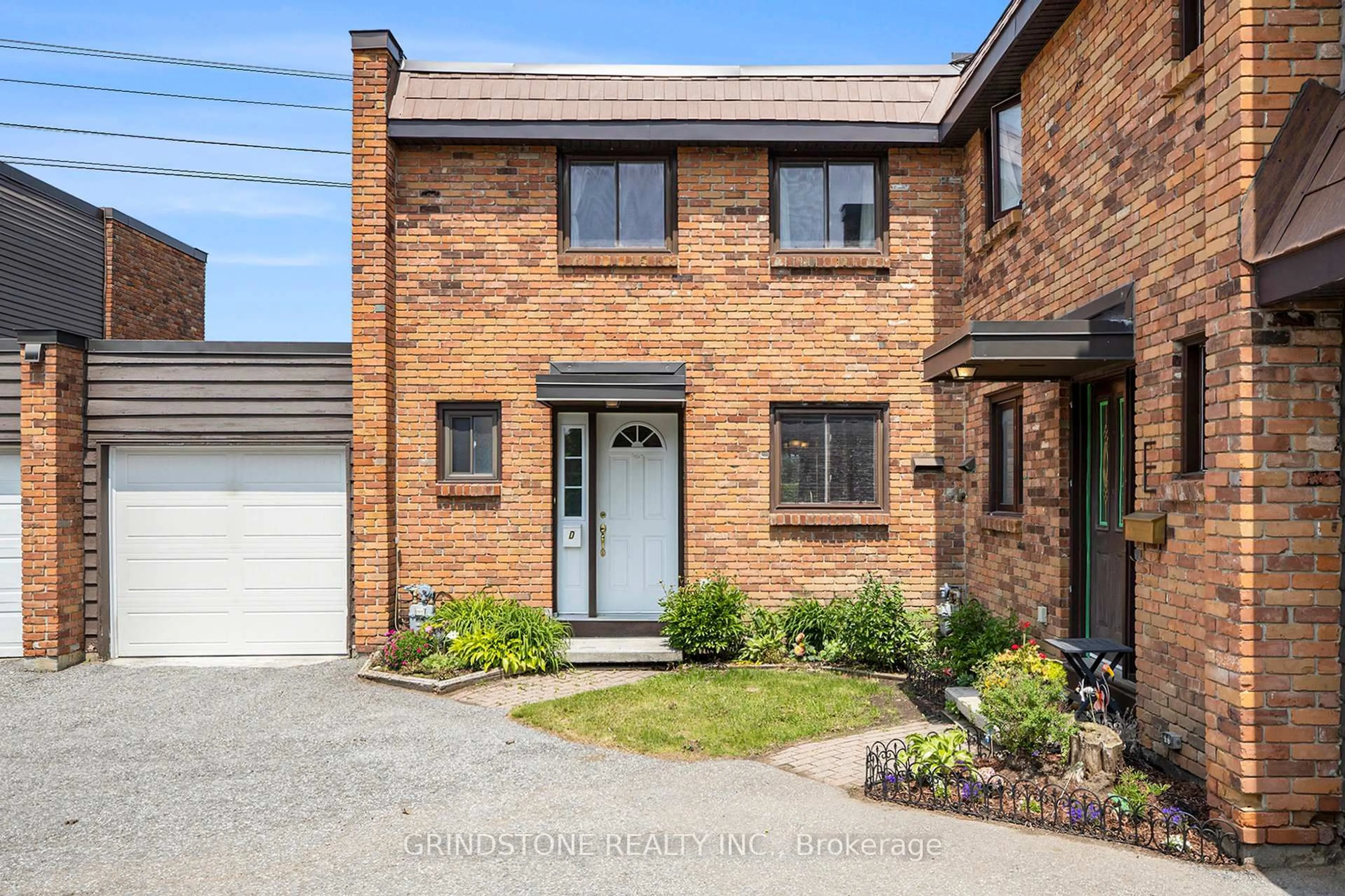 Home with brick exterior material, street for 3920 Old Richmond Rd #D, Ottawa Ontario K2H 5C6