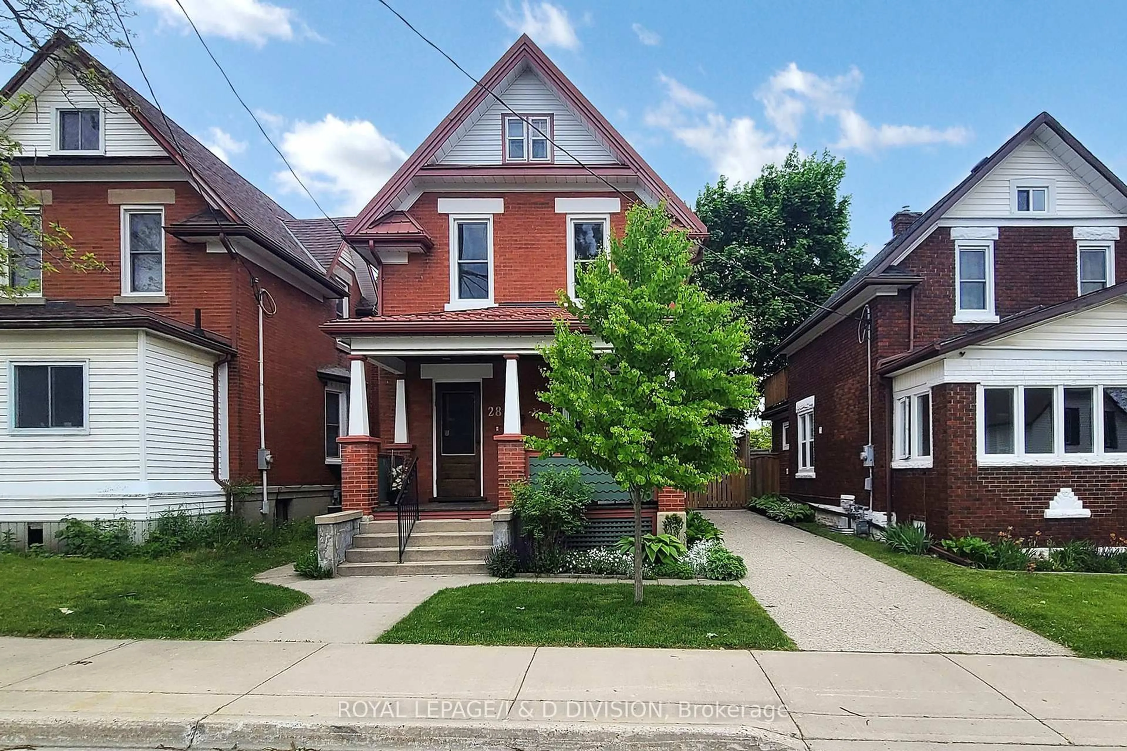 Home with brick exterior material, street for 28 Henry St, Kitchener Ontario N2G 1P3