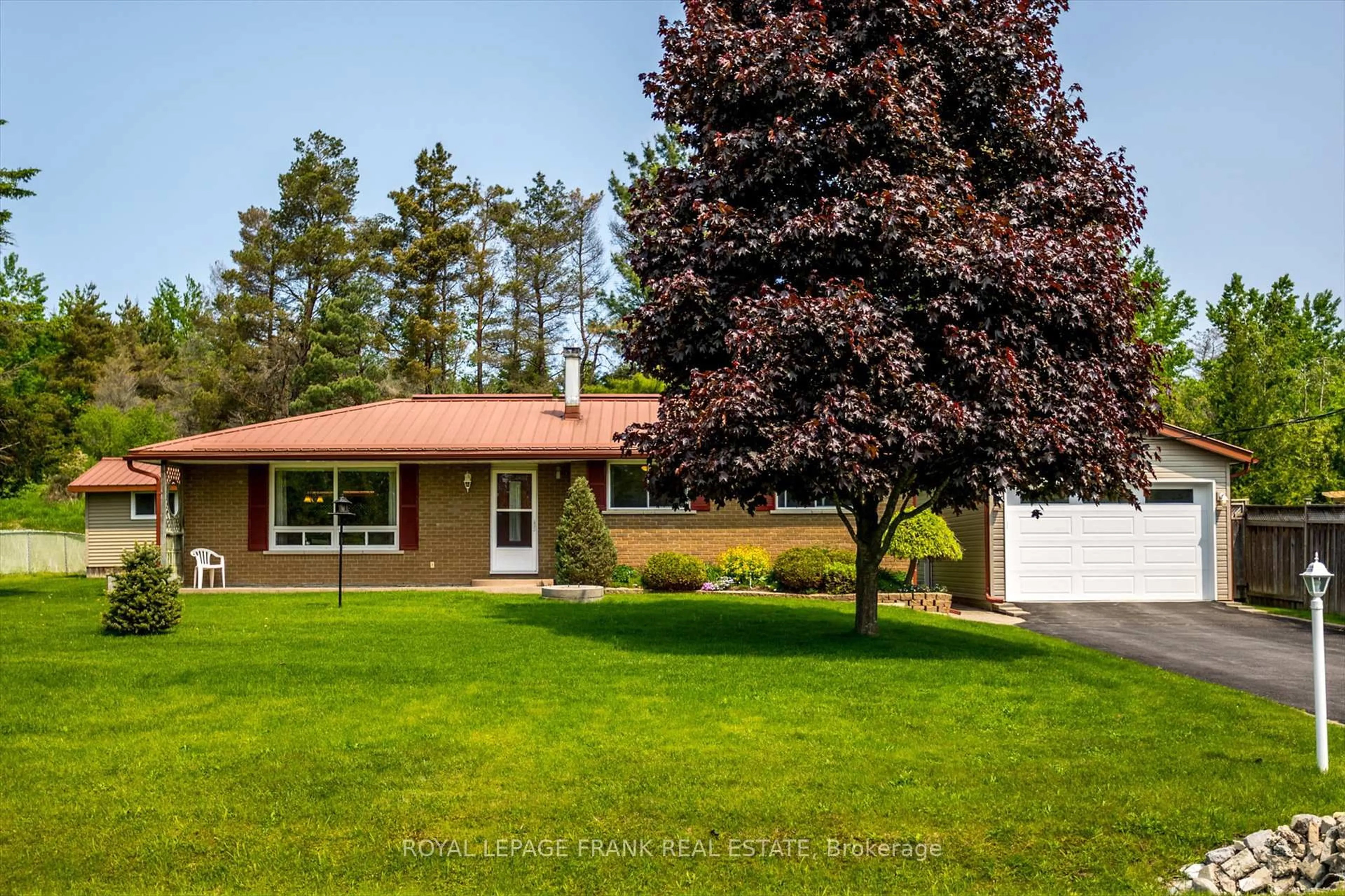 Home with vinyl exterior material, street for 1410 Morton Line, Cavan Monaghan Ontario L0A 1C0