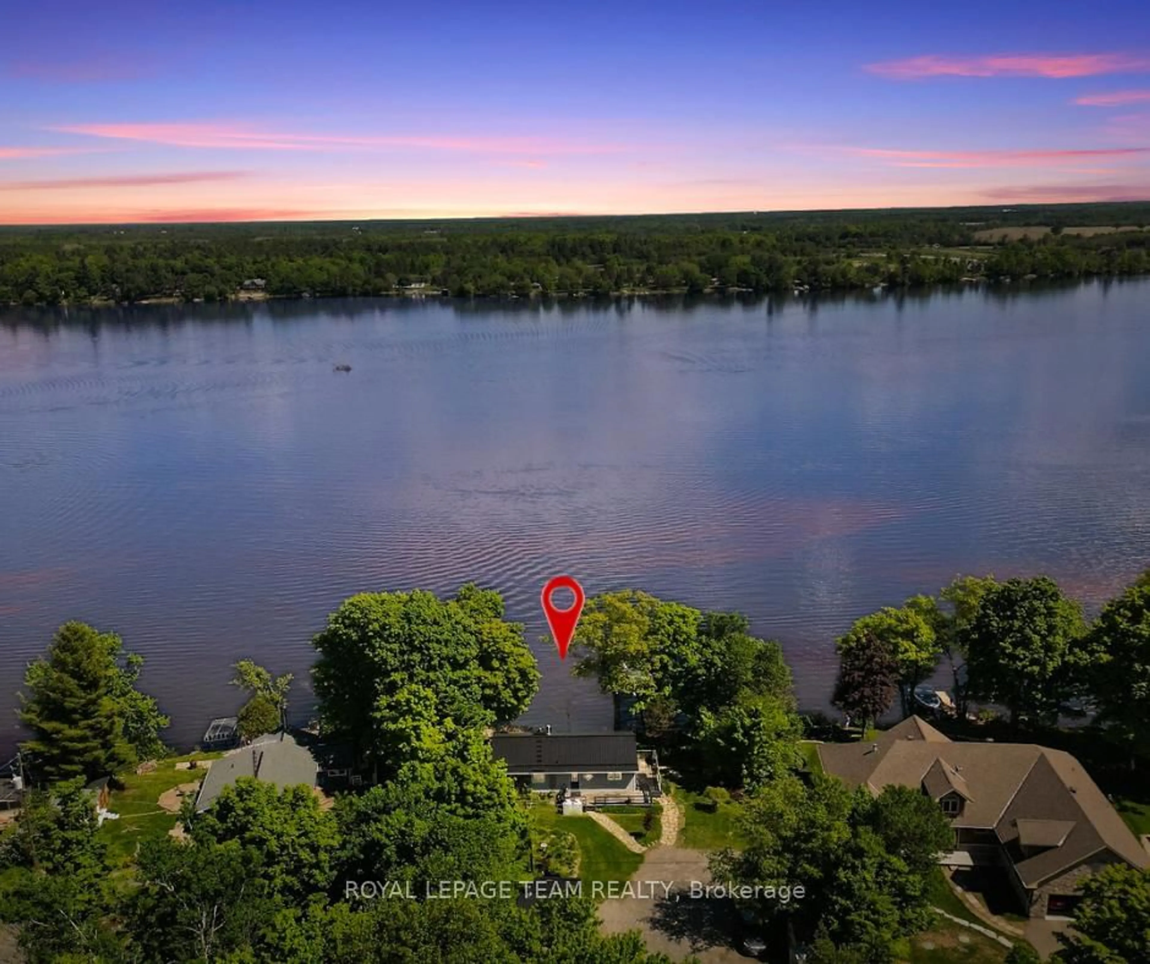 A pic from outside/outdoor area/front of a property/back of a property/a pic from drone, water/lake/river/ocean view for 110 Heron Lane, Carleton Place Ontario K7C 4L3