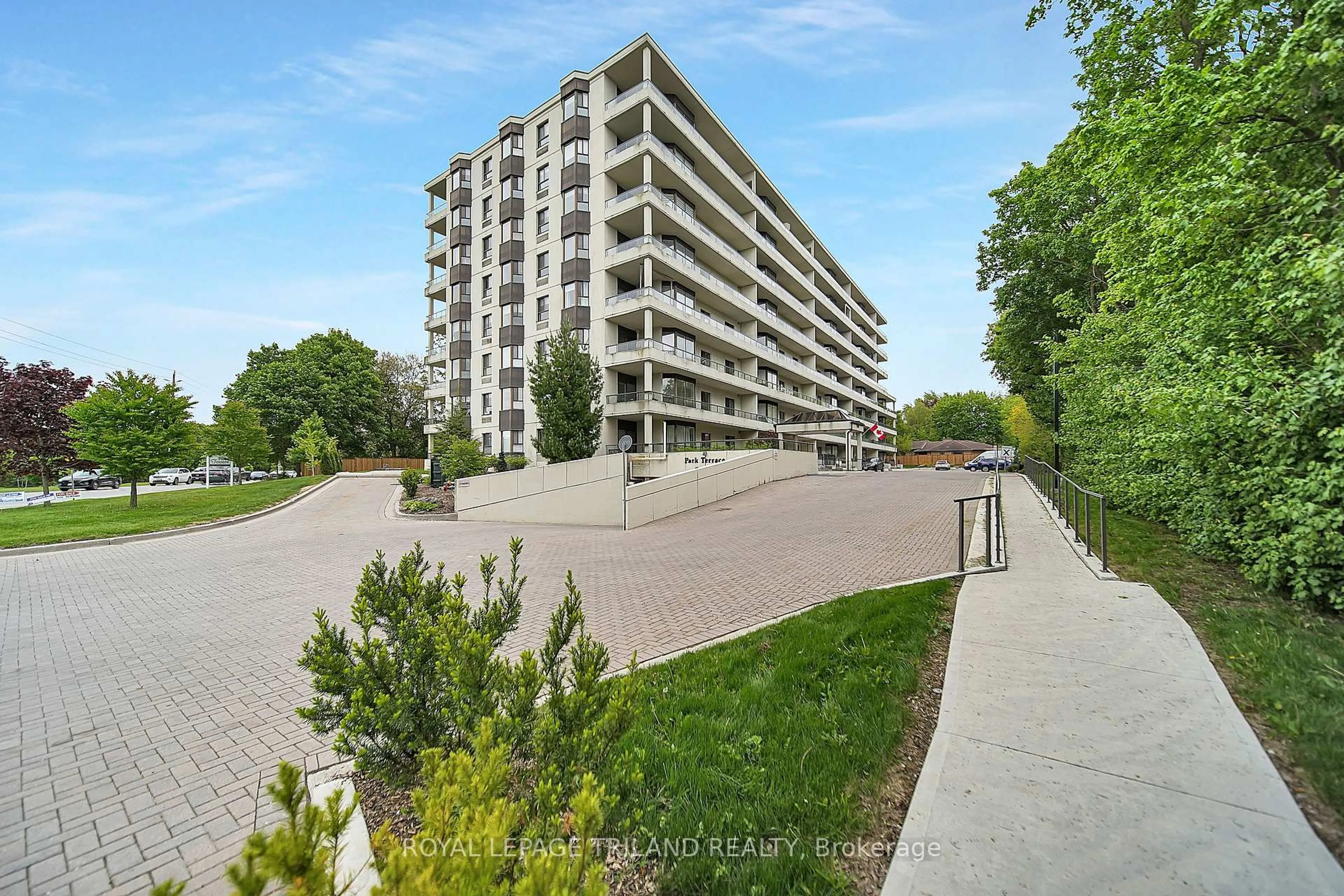 A pic from outside/outdoor area/front of a property/back of a property/a pic from drone, street for 1180 Commissioners Rd #409, London South Ontario N6K 4J2