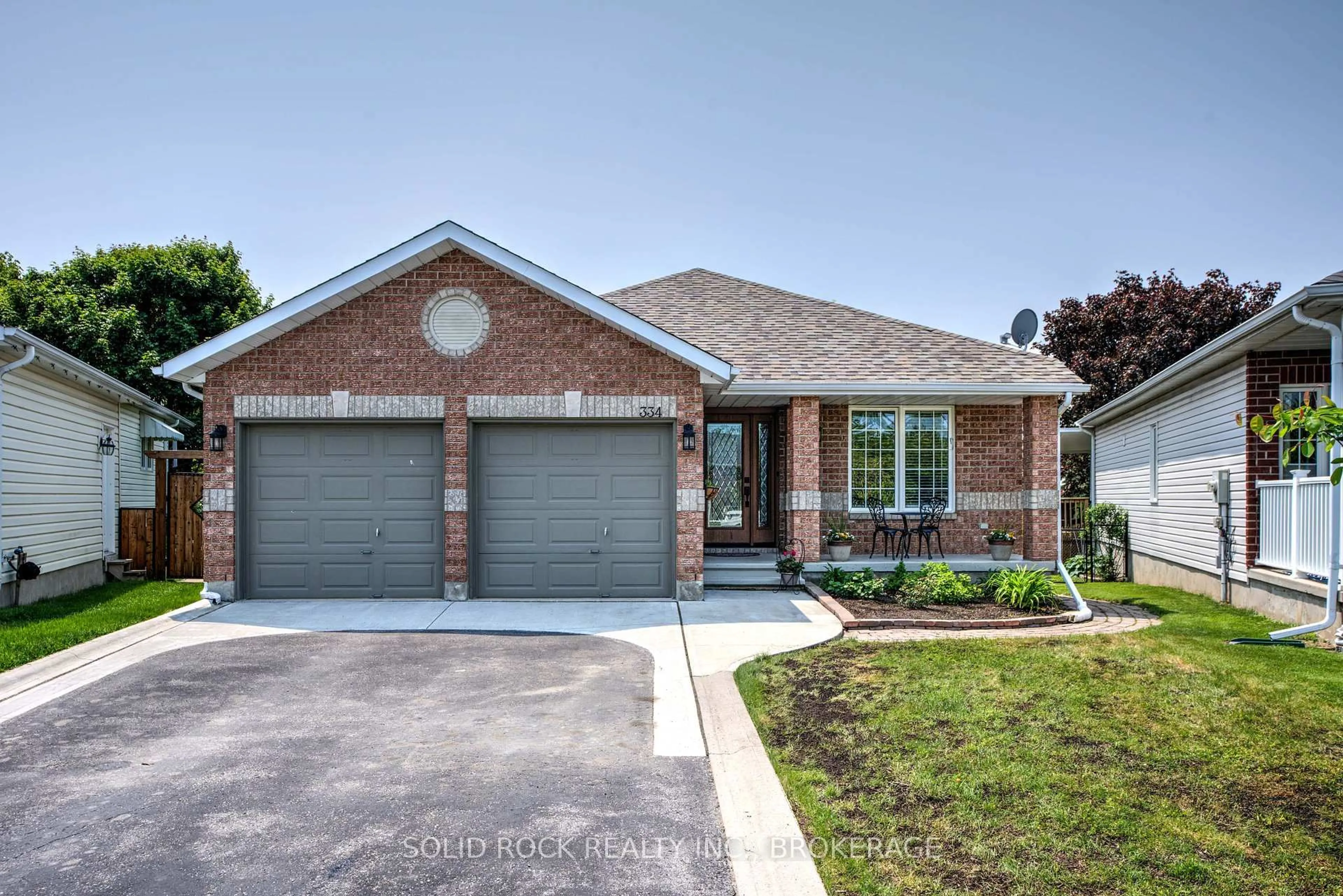 Home with brick exterior material, street for 334 Emerald St, Kingston Ontario K7P 3C9