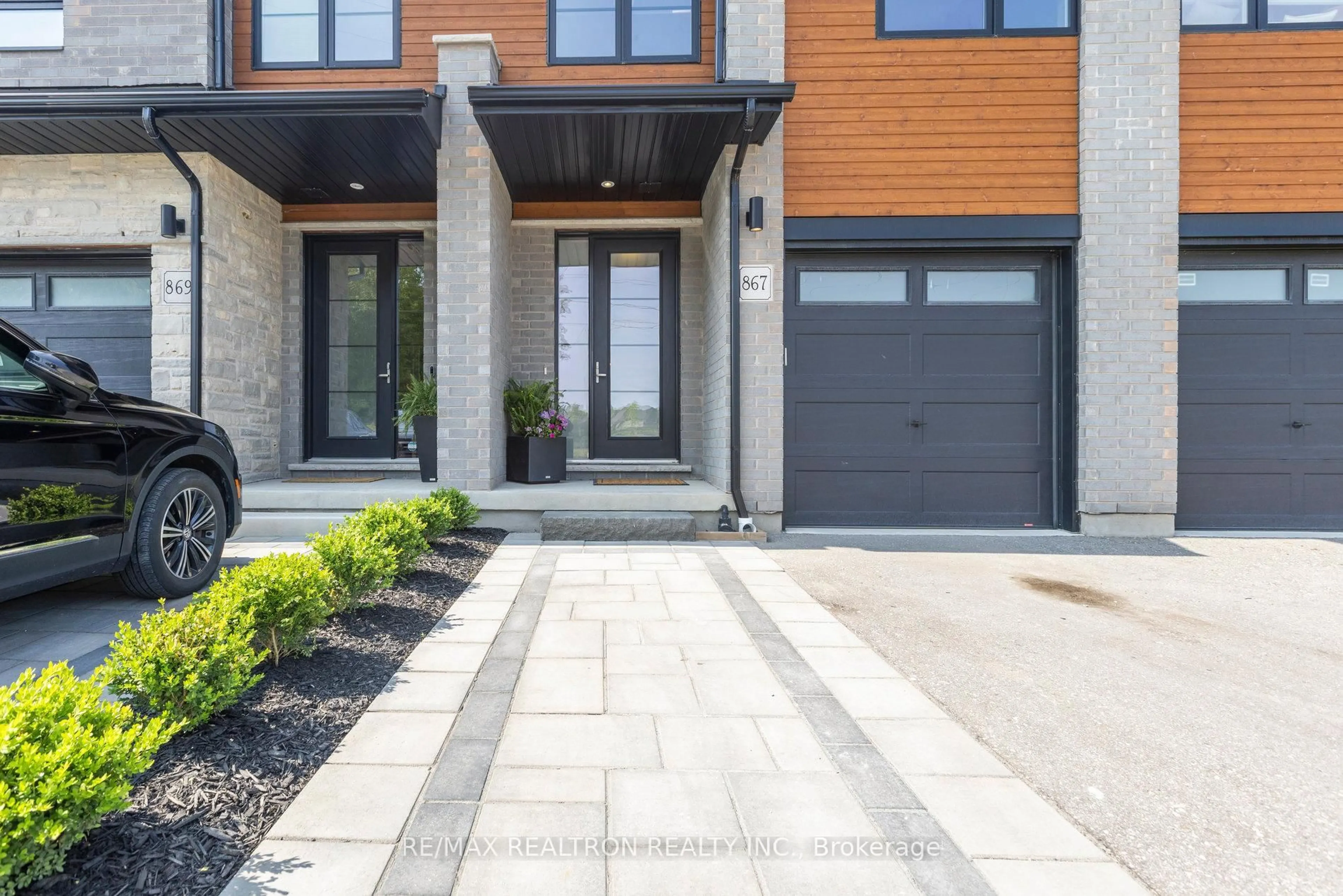 Home with brick exterior material, street for 867 Robert Ferrie Dr, Kitchener Ontario N2R 1P2