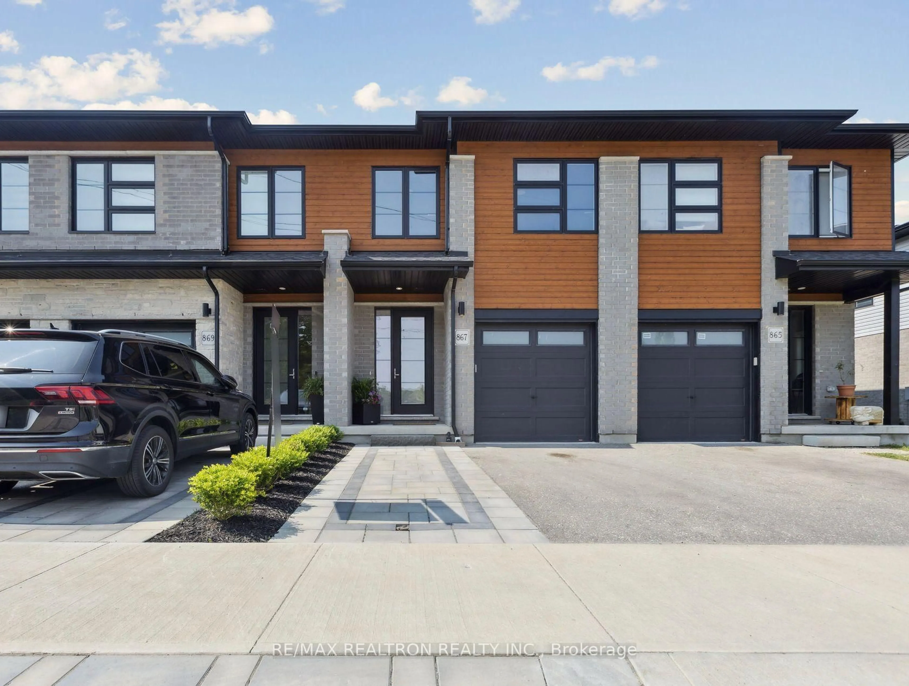 Home with brick exterior material, street for 867 Robert Ferrie Dr, Kitchener Ontario N2R 1P2