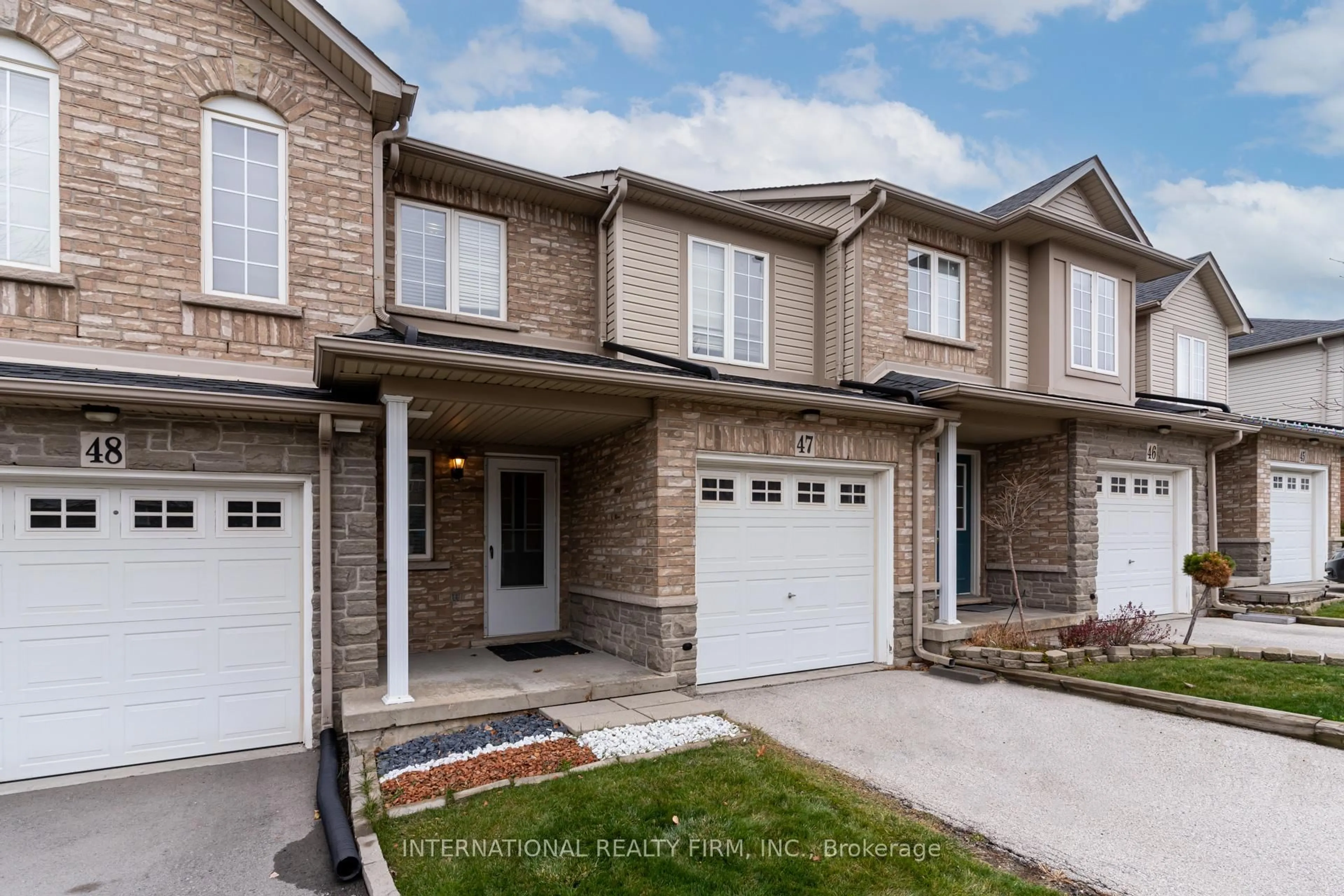 Home with brick exterior material, street for 7 Southside Pl #47, Hamilton Ontario L9C 7W6