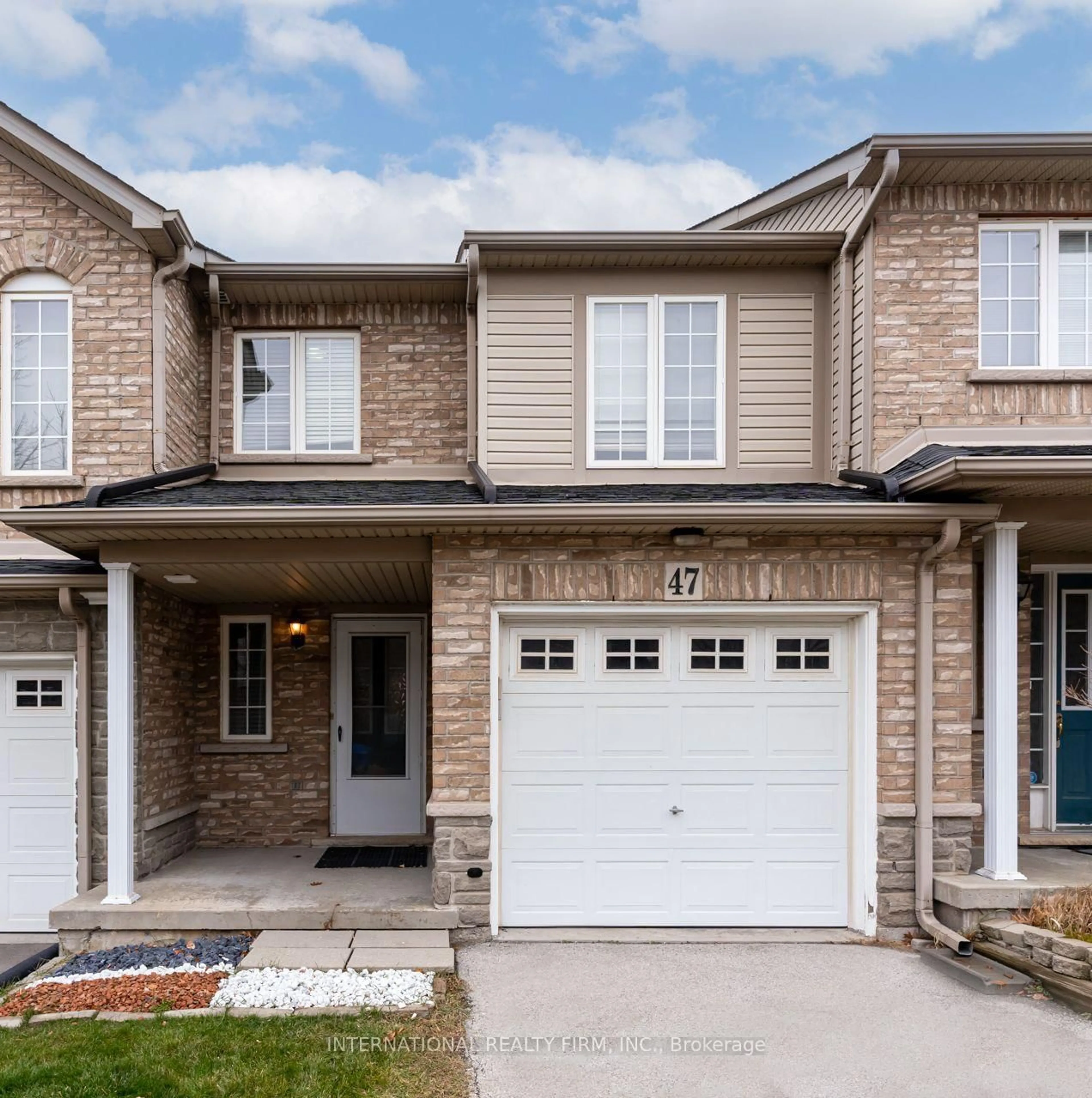 Home with brick exterior material, street for 7 Southside Pl #47, Hamilton Ontario L9C 7W6