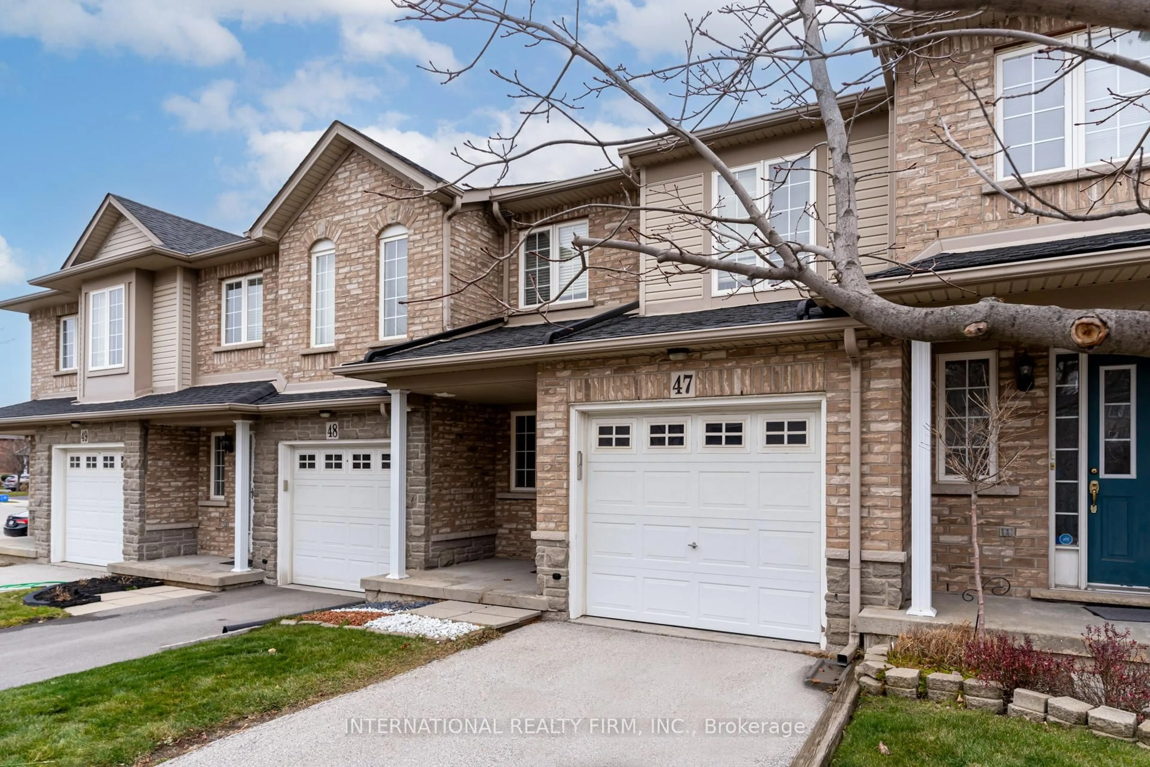 Home with brick exterior material, street for 7 Southside Pl #47, Hamilton Ontario L9C 7W6
