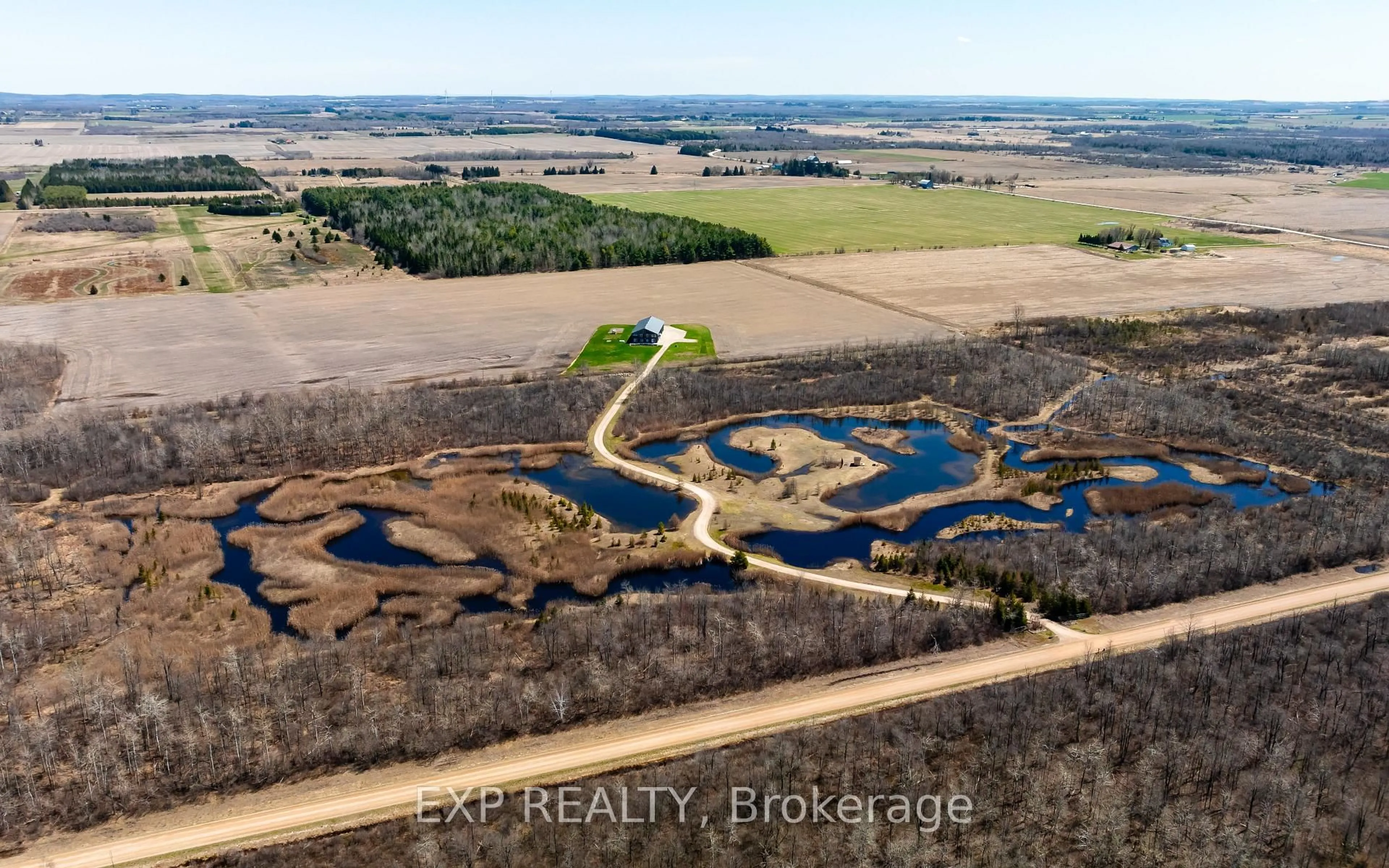 A pic from outside/outdoor area/front of a property/back of a property/a pic from drone, water/lake/river/ocean view for 295089 8th Line, Amaranth Ontario L9W 0K1