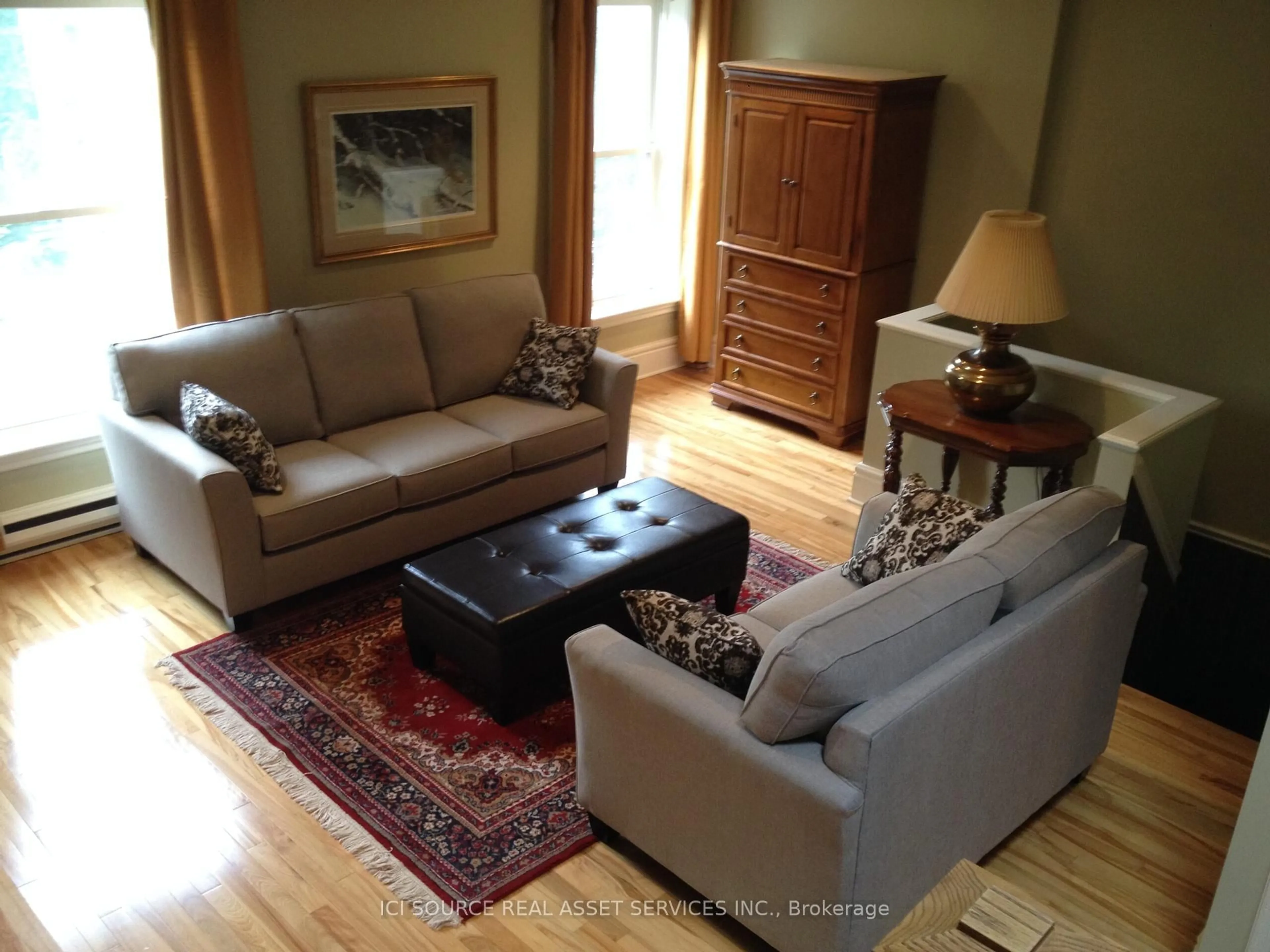 Living room with furniture, wood/laminate floor for 25 Beaconsfield Ave, London South Ontario N6C 1B6