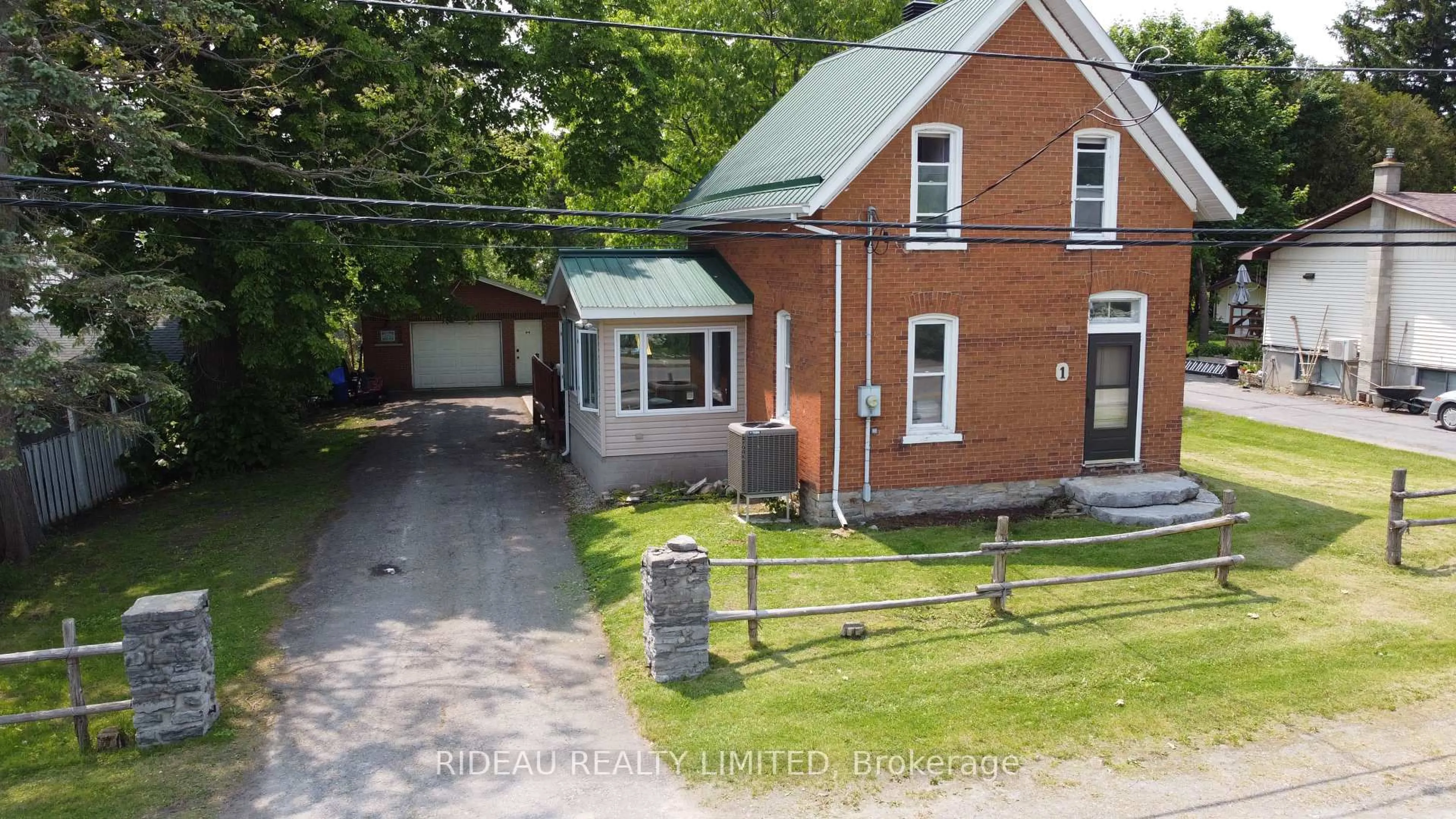A pic from outside/outdoor area/front of a property/back of a property/a pic from drone, street for 1 Mountain Rd, Westport Ontario K0G 1X0