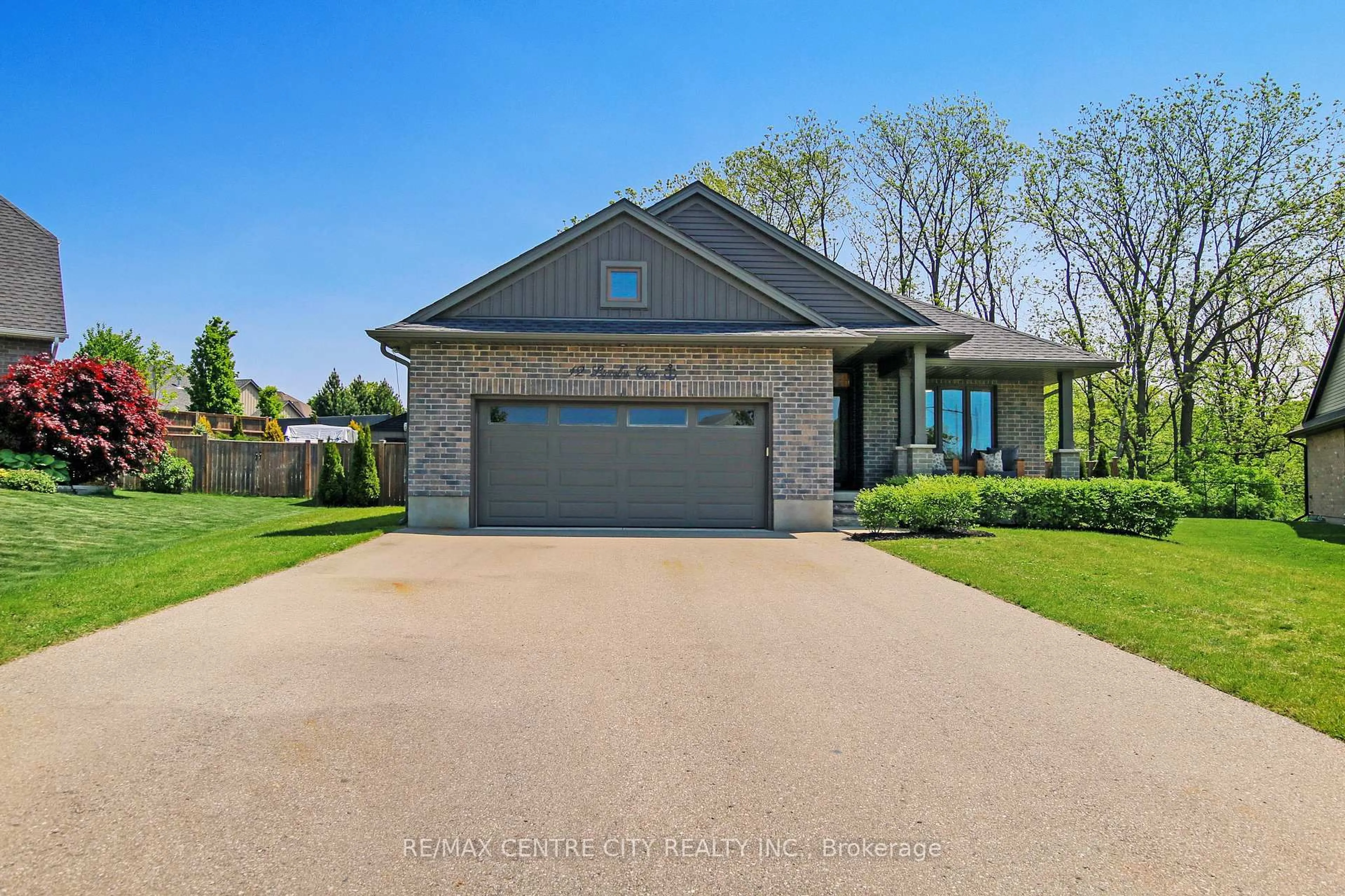 Home with brick exterior material, street for 12 LINCOLN'S COVE N/A, Central Elgin Ontario N5L 0A8