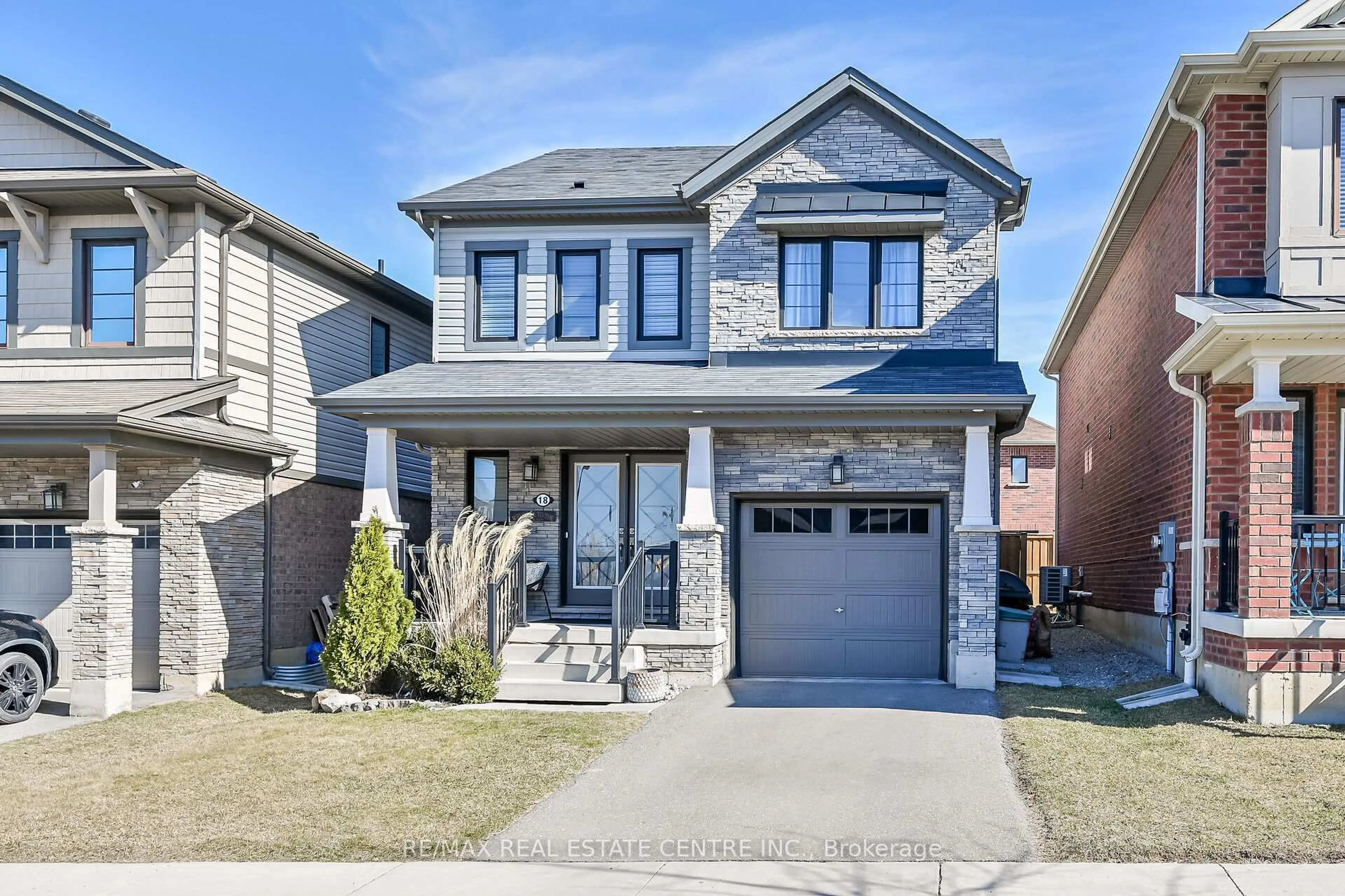 Home with brick exterior material, street for 18 Scarletwood St, Hamilton Ontario L8J 0K8