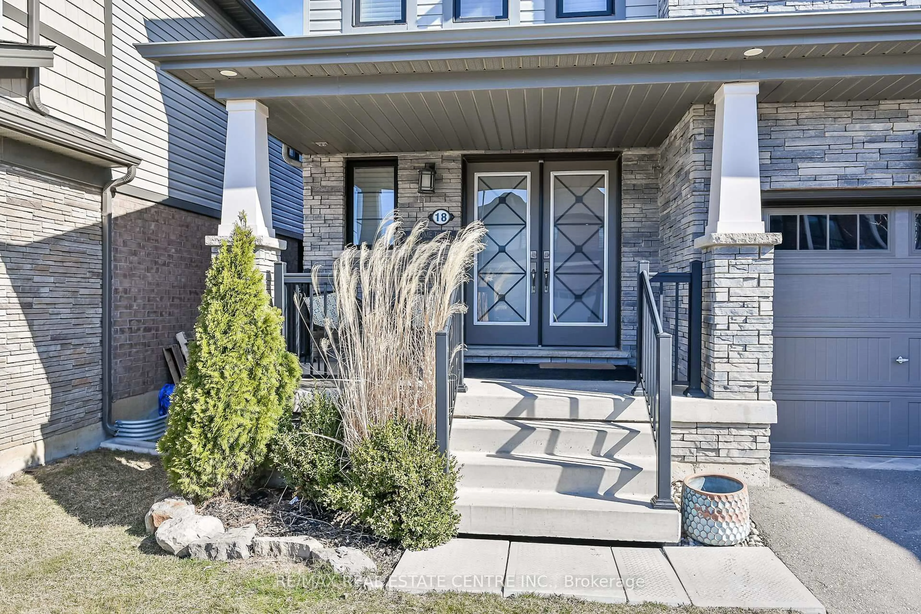 Home with brick exterior material, street for 18 Scarletwood St, Hamilton Ontario L8J 0K8