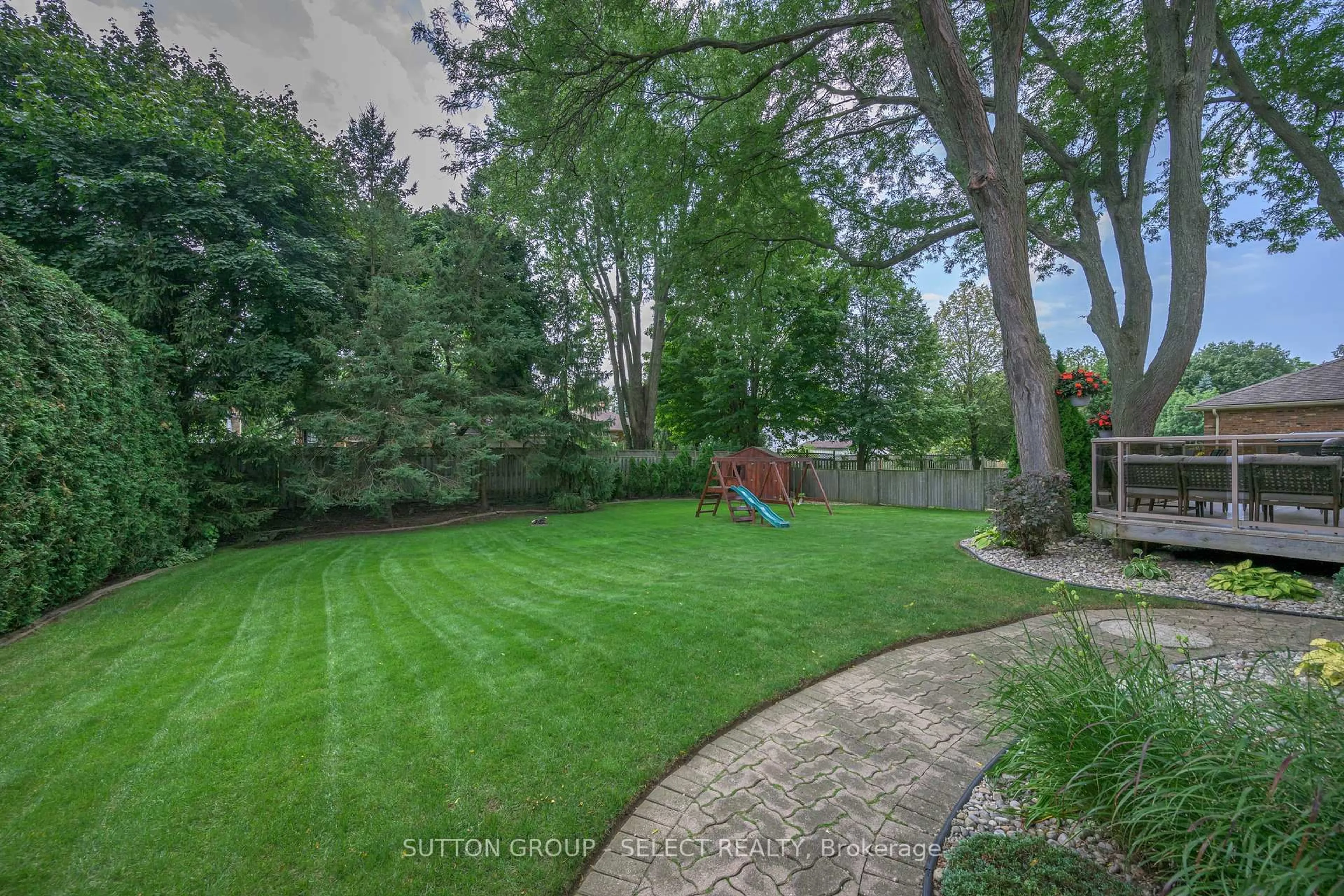 A pic from outside/outdoor area/front of a property/back of a property/a pic from drone, forest/trees view for 6907 Lambeth Walk, London South Ontario N6P 1A5