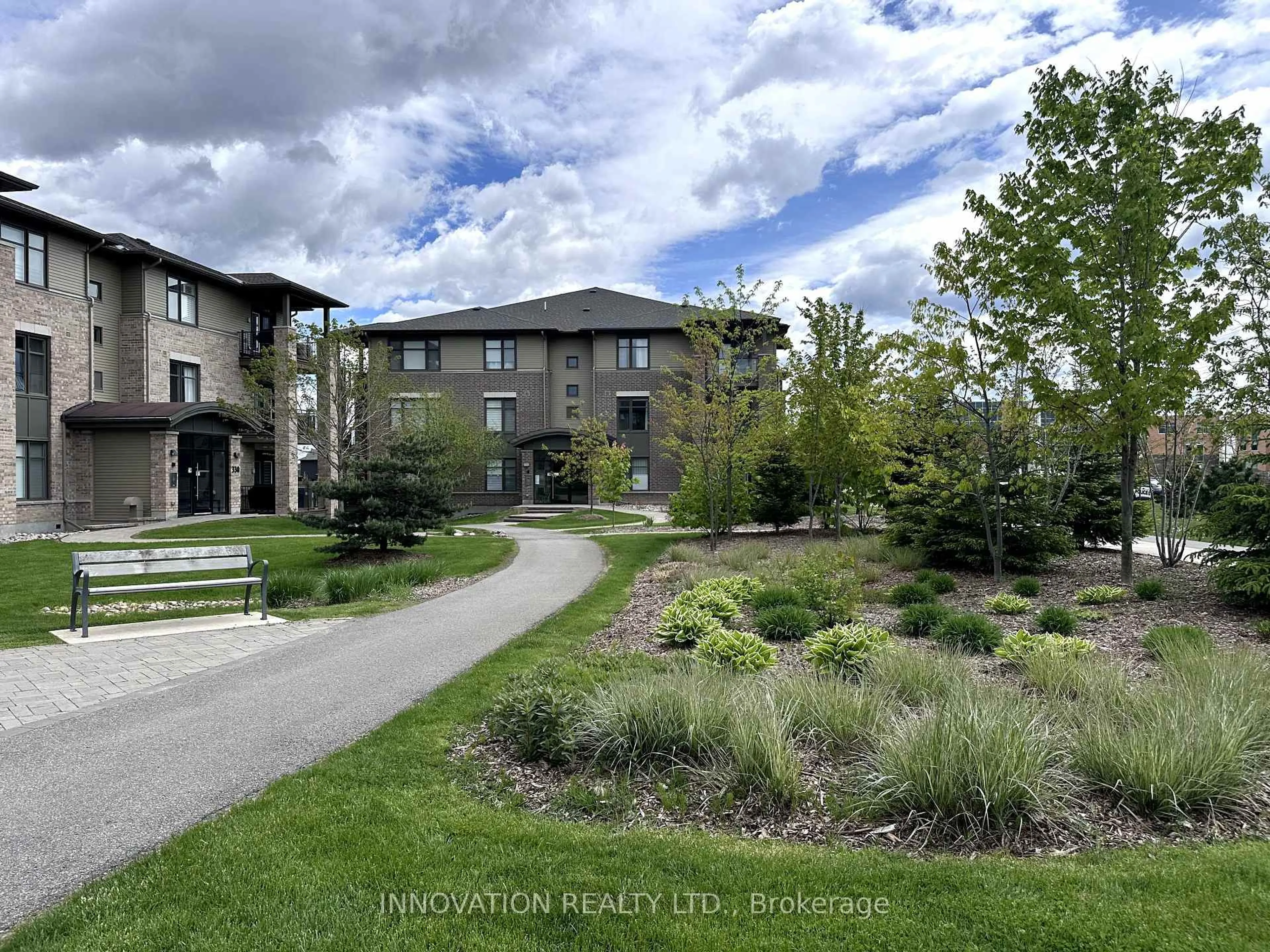 A pic from outside/outdoor area/front of a property/back of a property/a pic from drone, mountain view for 320 Jatoba #103, Ottawa Ontario K2V 0E7