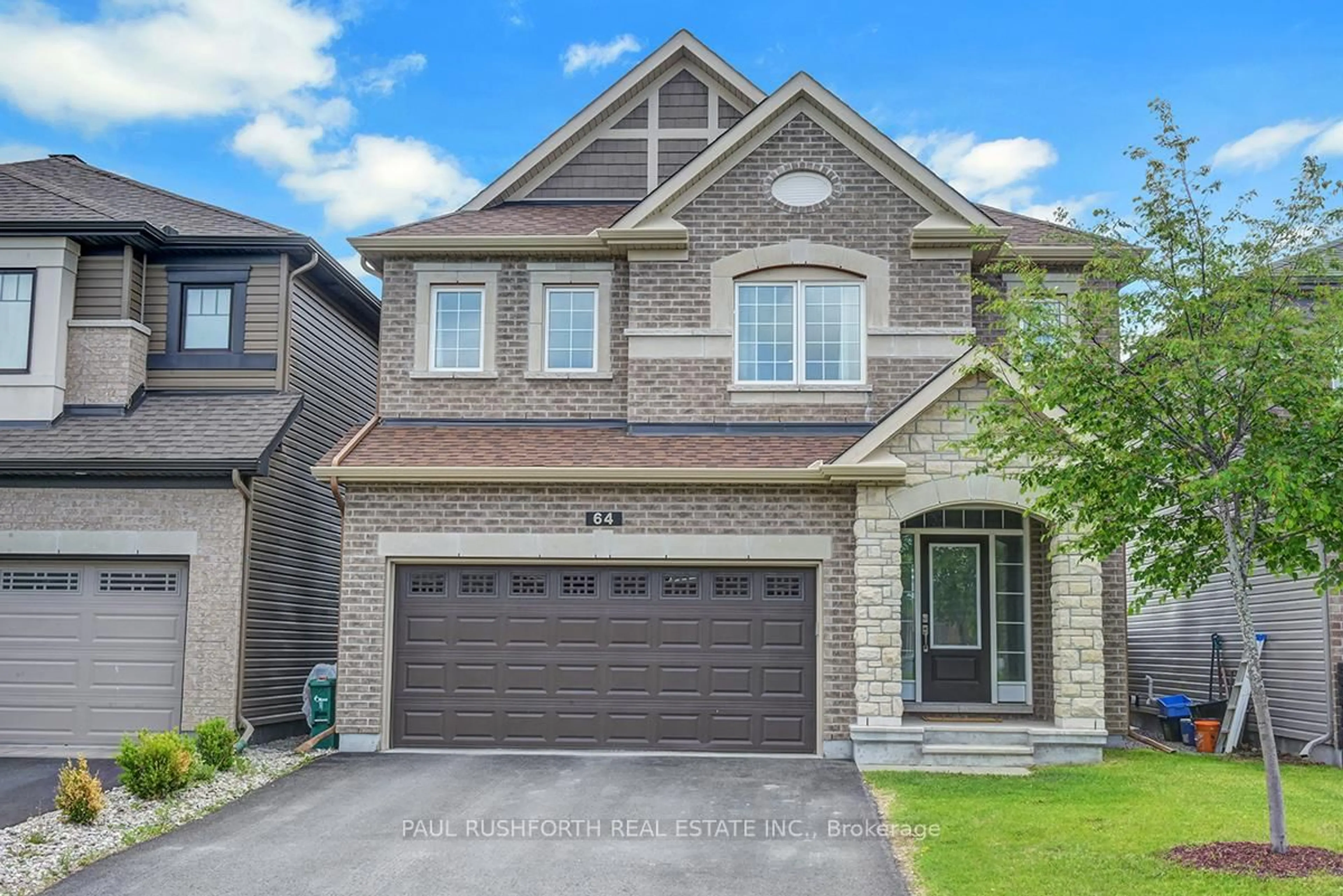 Home with brick exterior material, street for 64 Knockaderry Cres, Ottawa Ontario K2J 6G8
