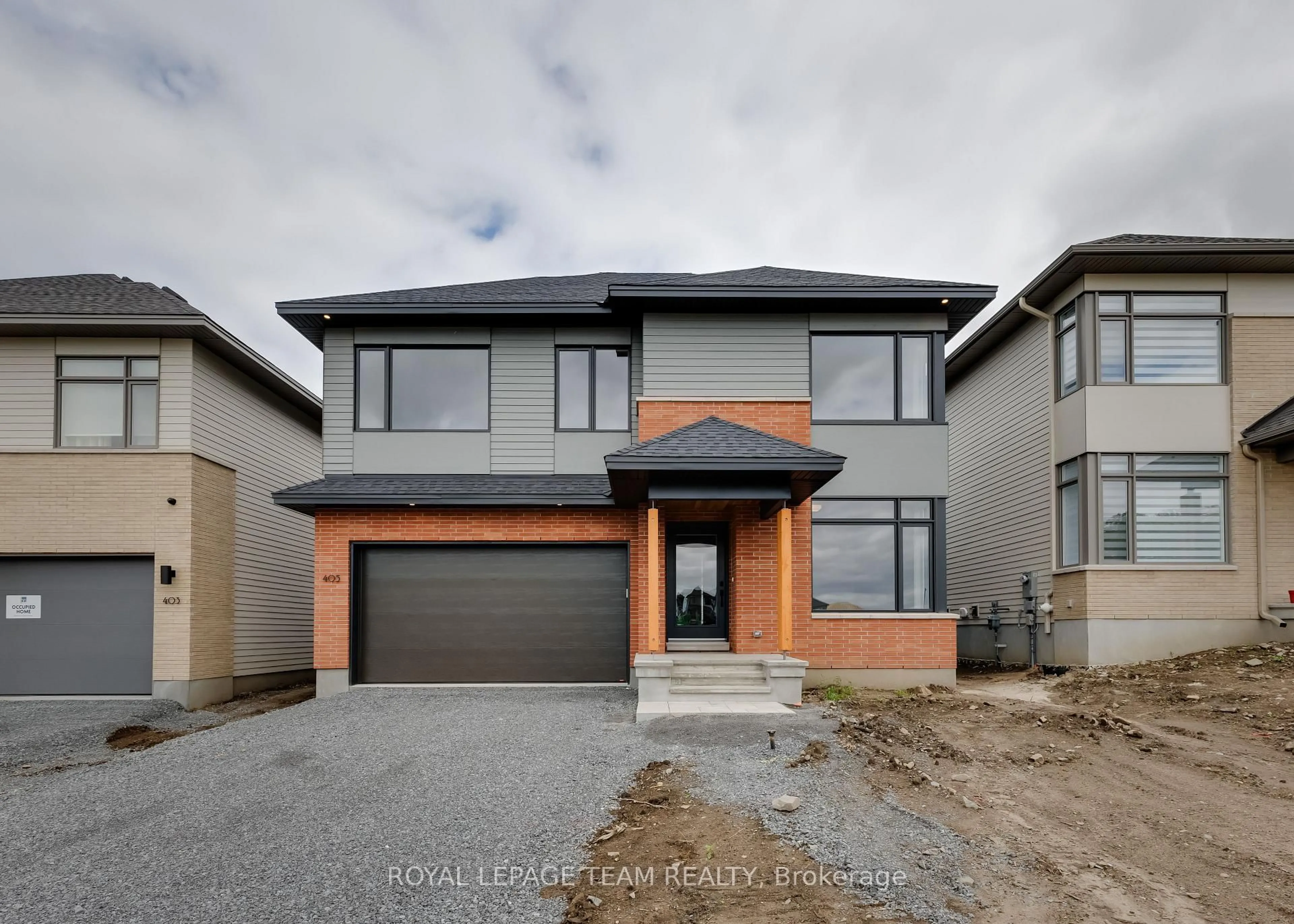 Home with brick exterior material, street for 405 Point Grey Terr, Kanata Ontario K2K 0M5