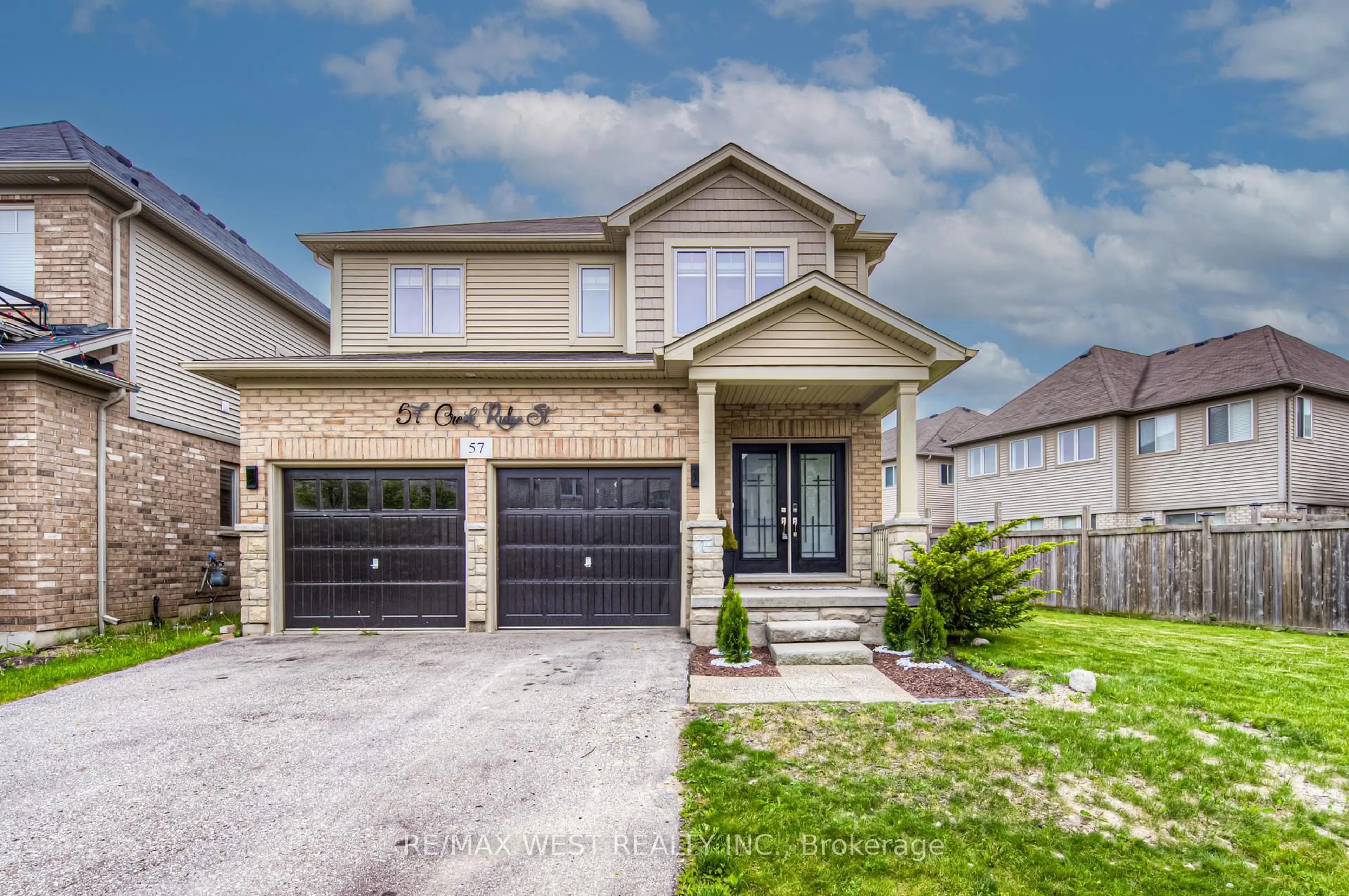 Home with brick exterior material, street for 57 Creek Ridge St, Kitchener Ontario N2R 0B6