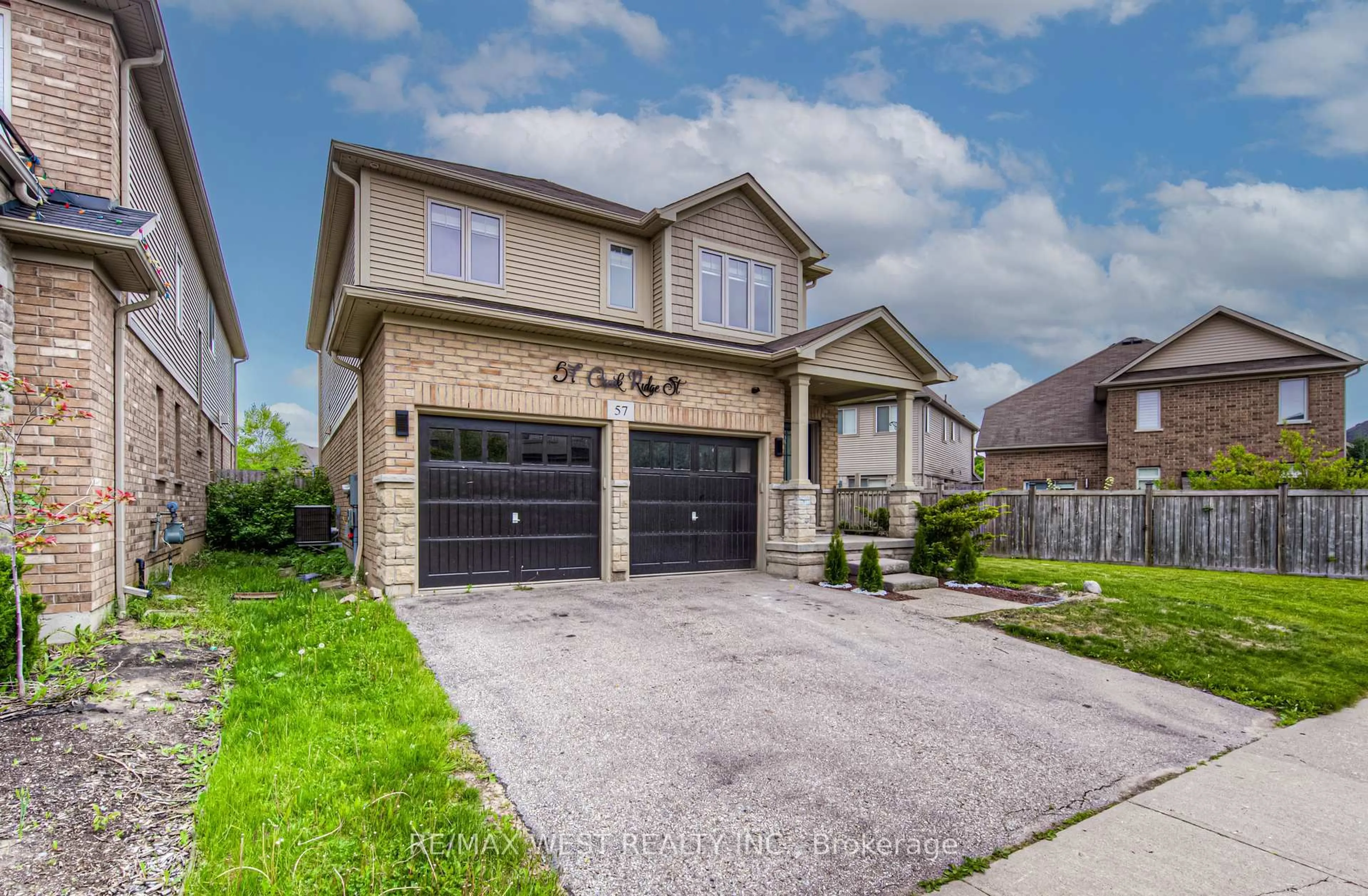 Home with brick exterior material, street for 57 Creek Ridge St, Kitchener Ontario N2R 0B6