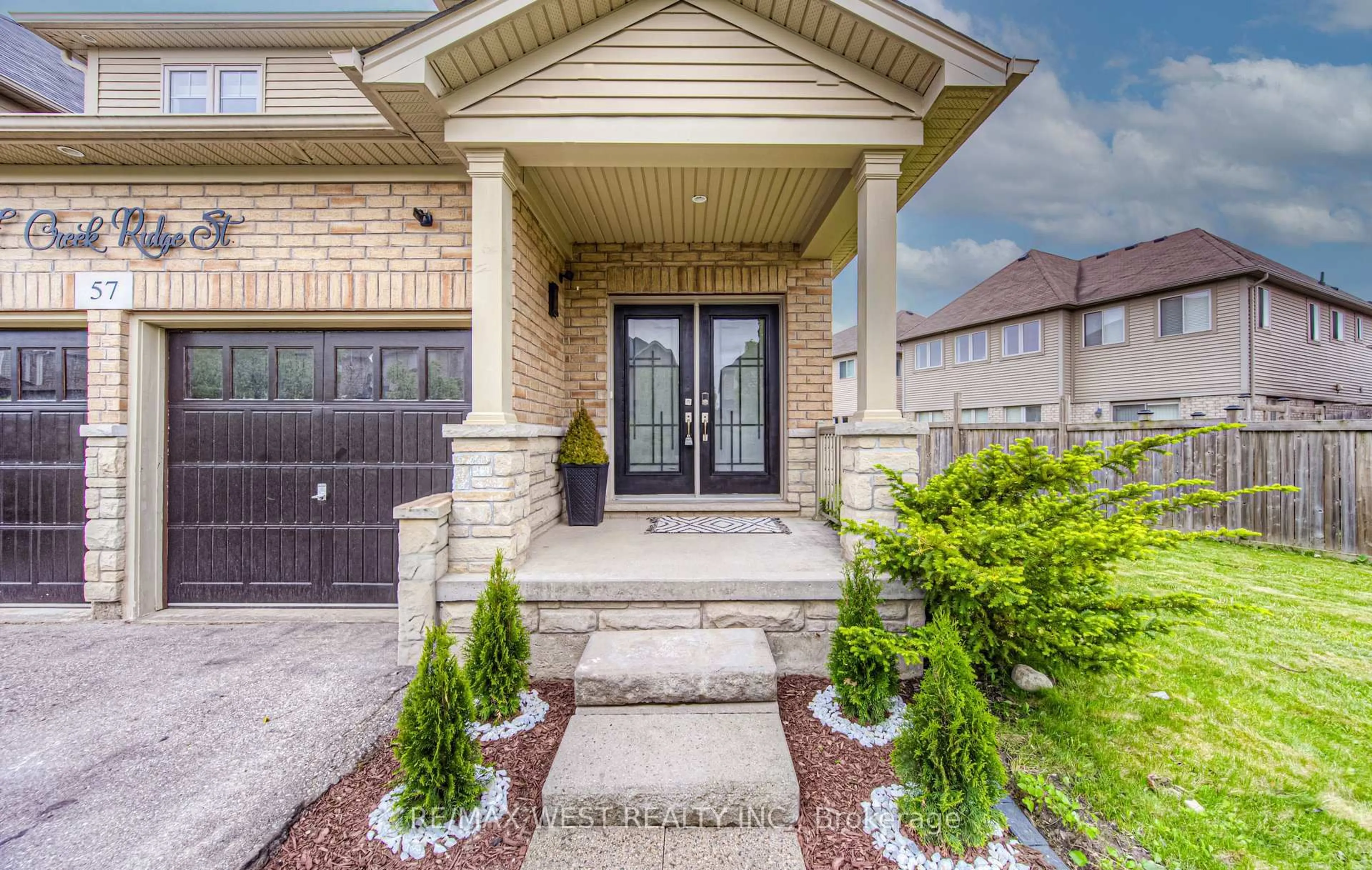 Home with brick exterior material, street for 57 Creek Ridge St, Kitchener Ontario N2R 0B6
