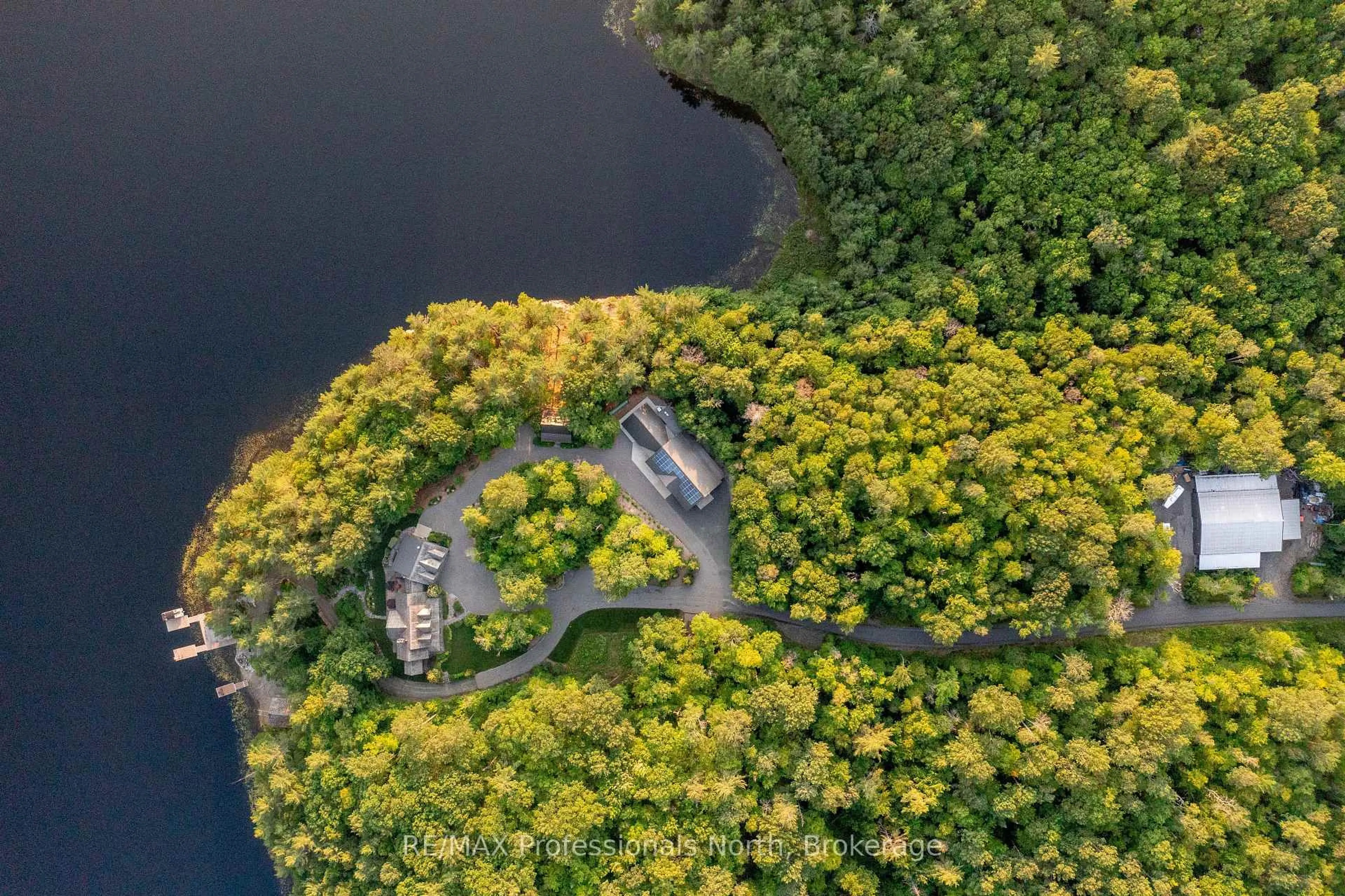 A pic from outside/outdoor area/front of a property/back of a property/a pic from drone, water/lake/river/ocean view for 1600 Misty Knoll Tr, Dysart et al Ontario K0M 1S0