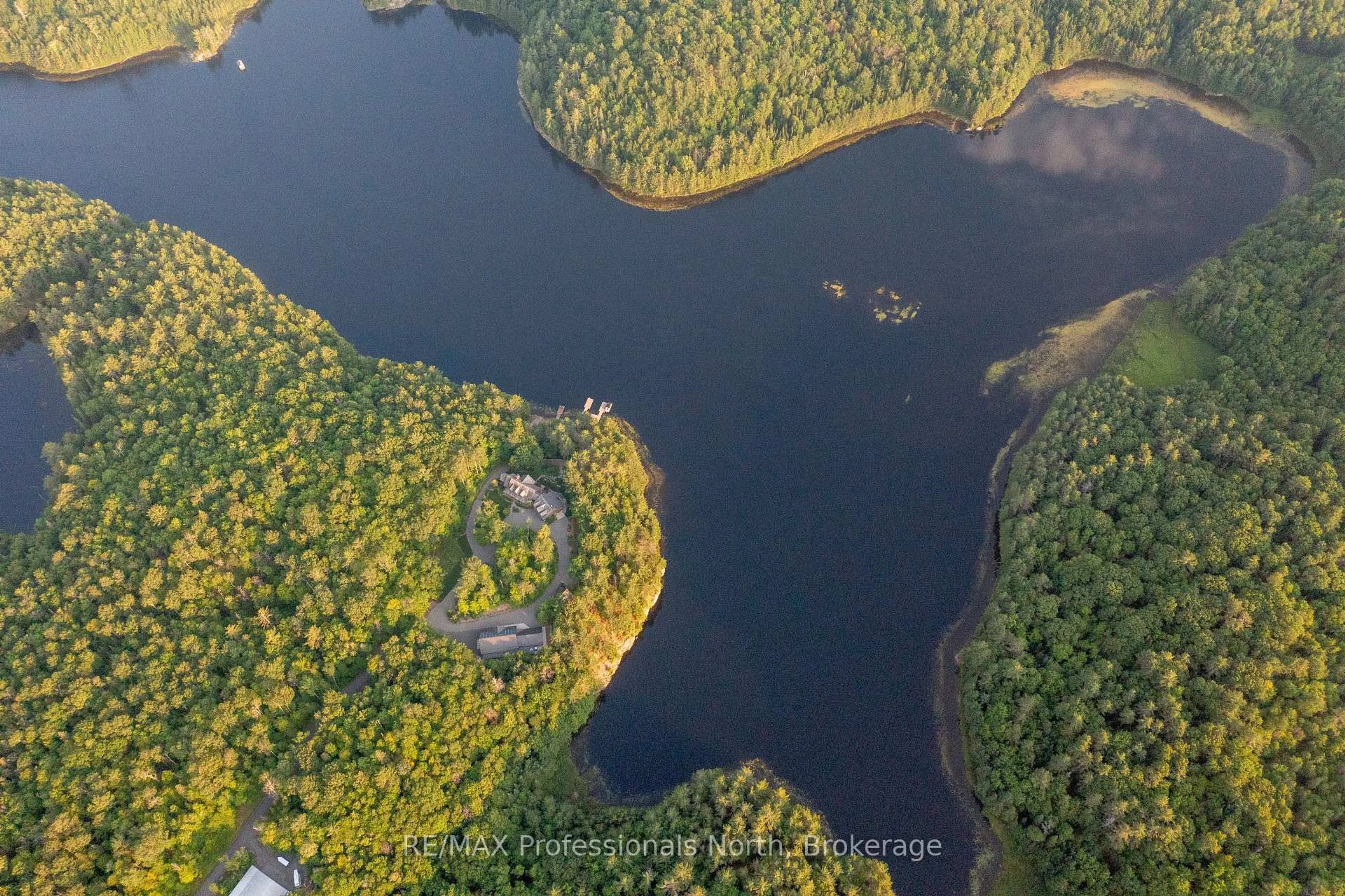 A pic from outside/outdoor area/front of a property/back of a property/a pic from drone, water/lake/river/ocean view for 1600 Misty Knoll Tr, Dysart et al Ontario K0M 1S0