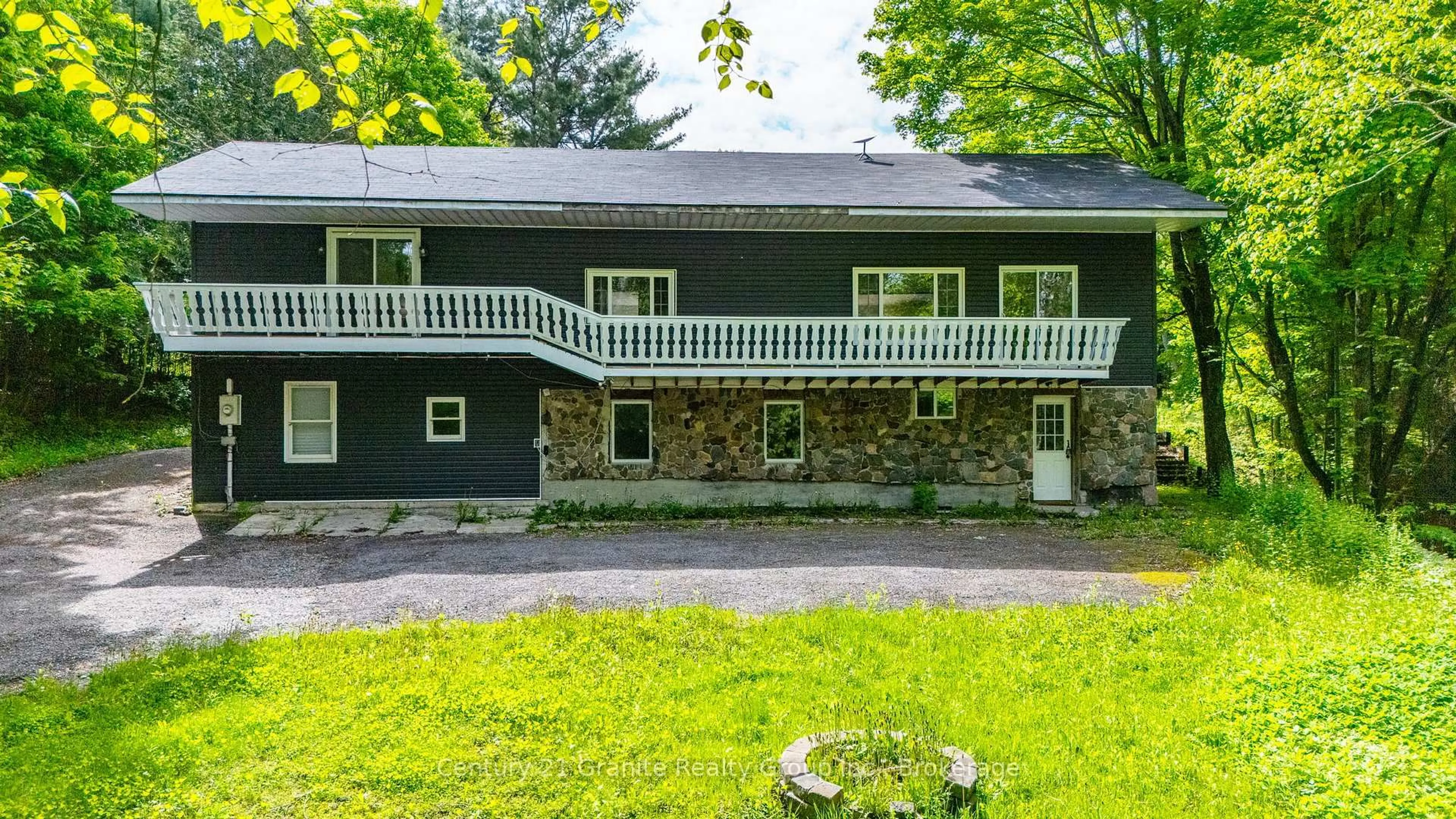 A pic from outside/outdoor area/front of a property/back of a property/a pic from drone, unknown for 1630 Kashagawigamog Lake Rd, Minden Hills Ontario K0M 2K0