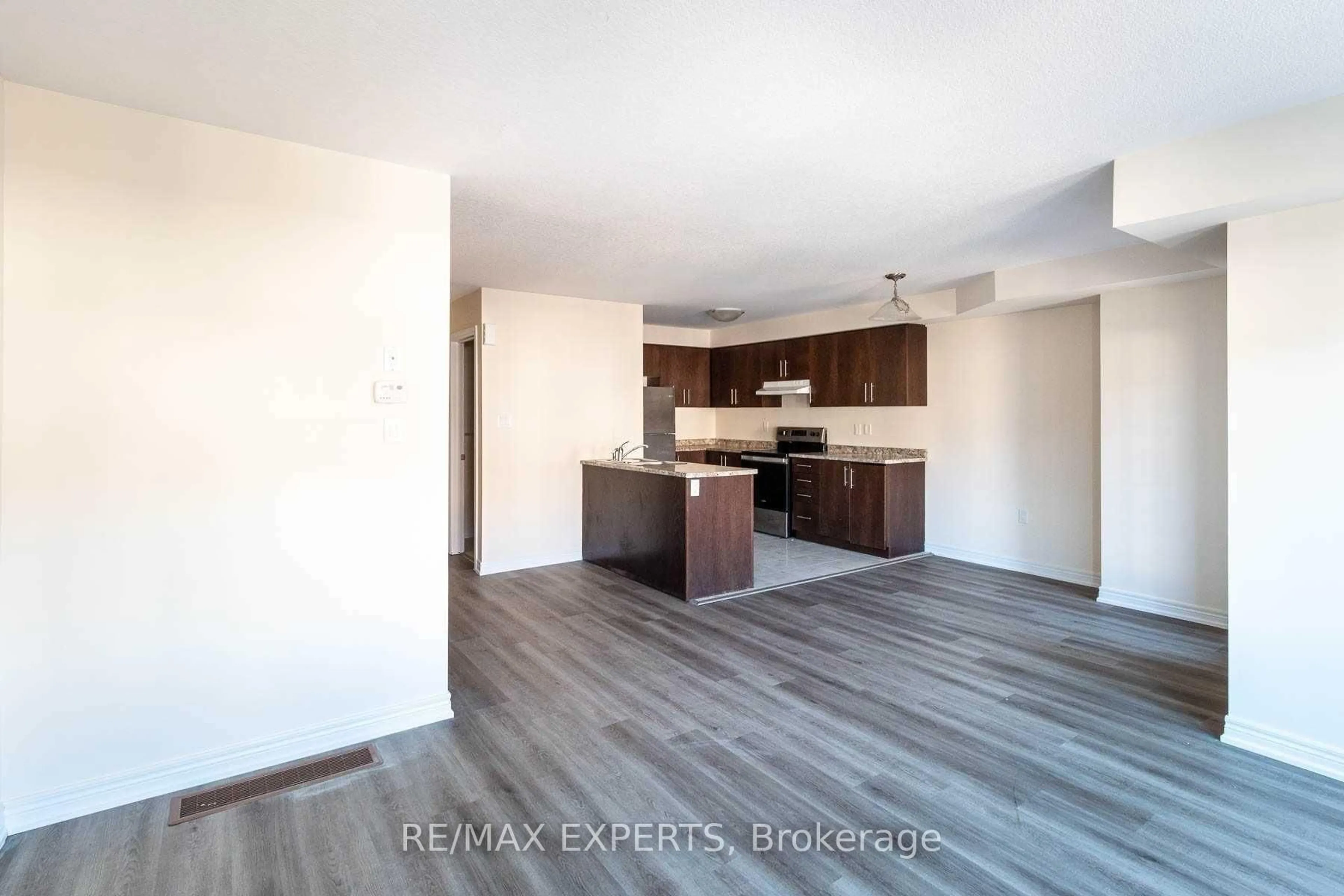 Open concept kitchen, wood/laminate floor for 755 Linden Dr #60, Cambridge Ontario N3H 0E4