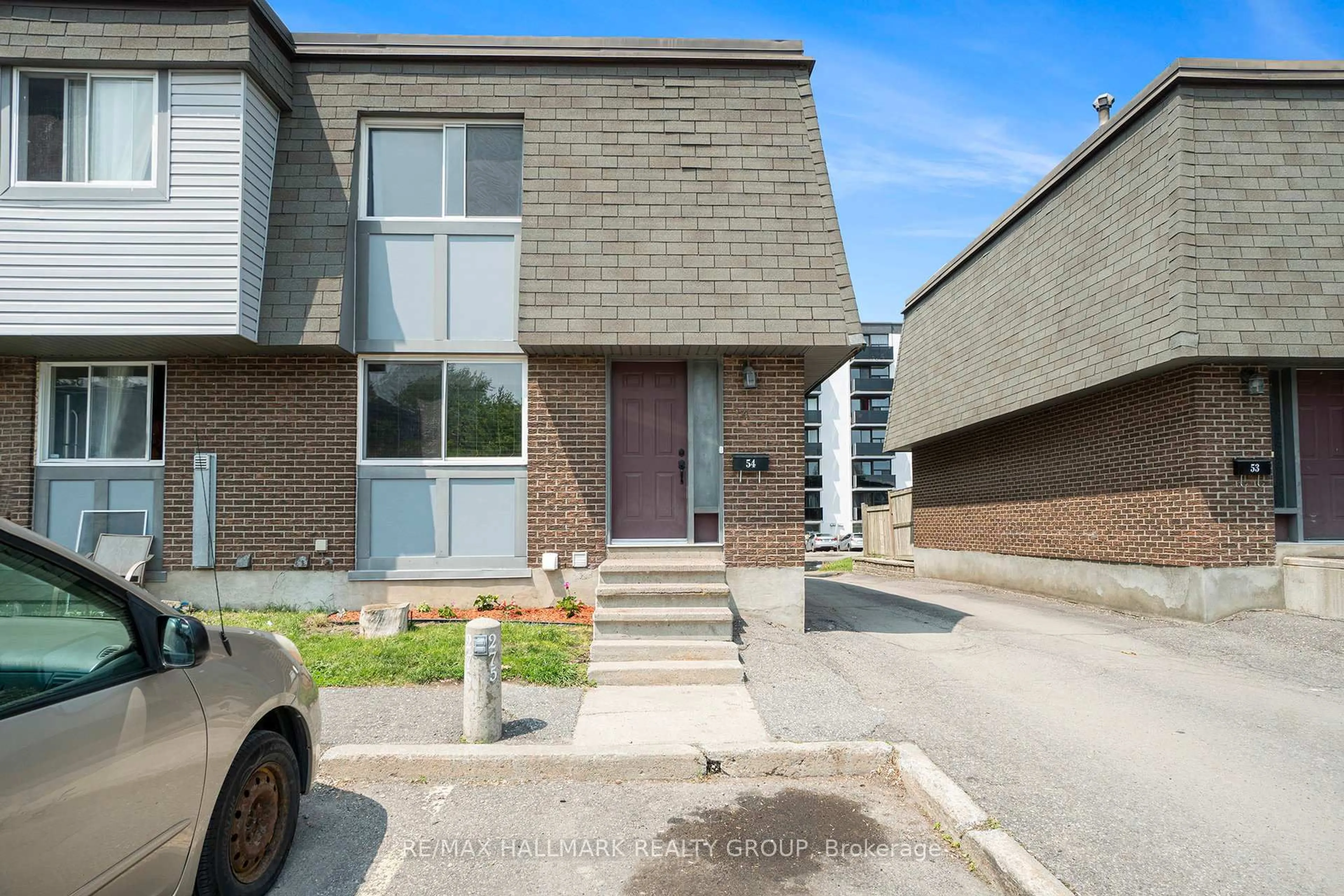 Home with brick exterior material, street for 54 Corley Private, Ottawa Ontario K1V 8T7