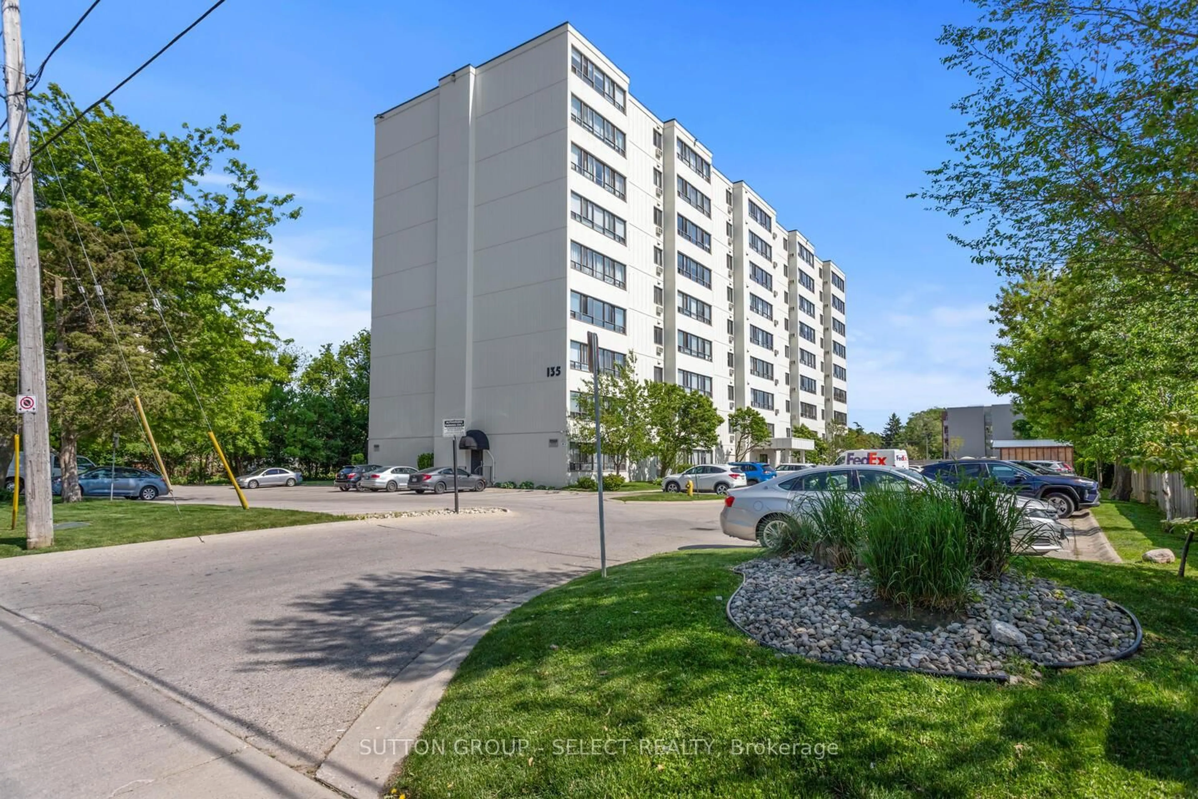 A pic from outside/outdoor area/front of a property/back of a property/a pic from drone, street for 135 Baseline Rd #10, London South Ontario N6J 4W4