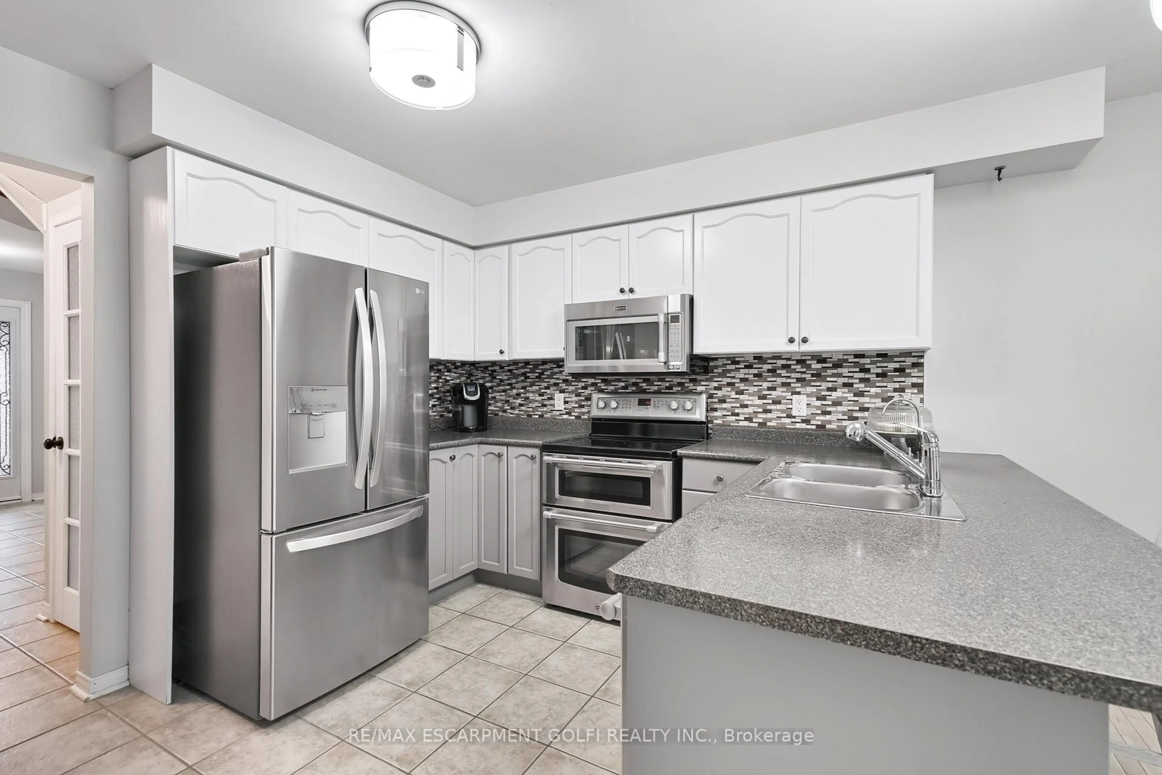 Standard kitchen, ceramic/tile floor for 317 Jacqueline Blvd, Hamilton Ontario L9B 2V7