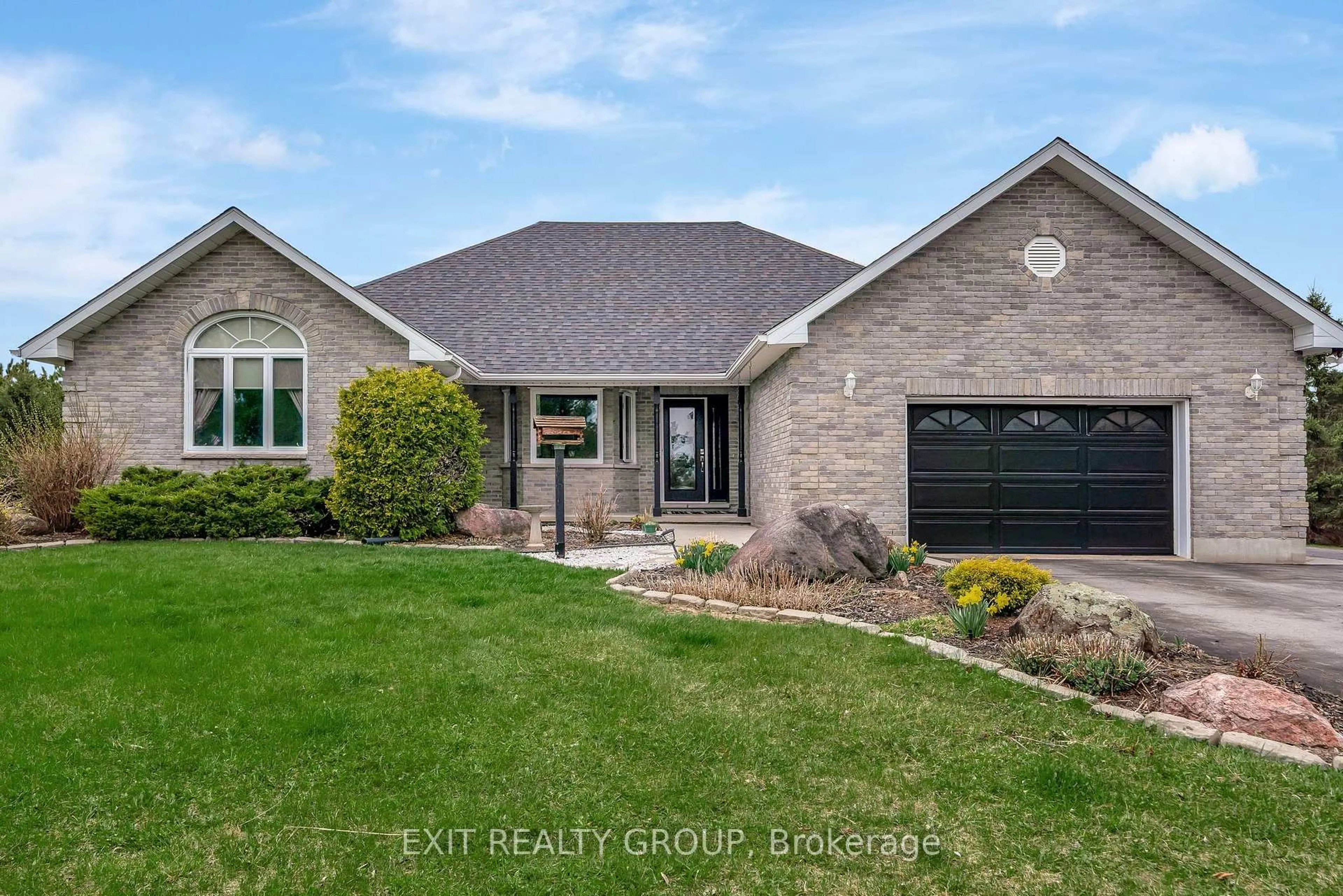 Home with brick exterior material, street for 39 Woods Rd, Madoc Ontario K0K 2K0