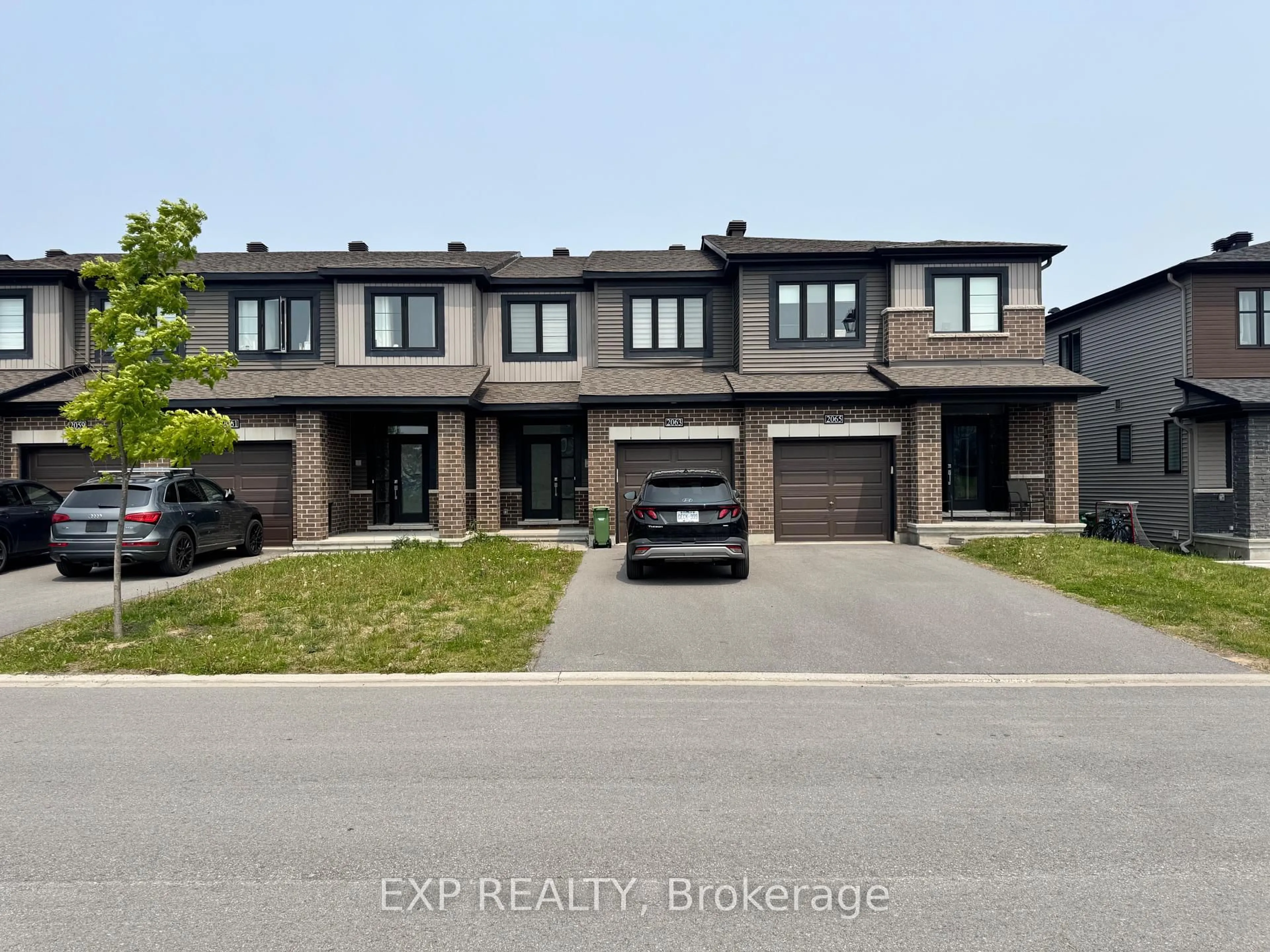 Home with brick exterior material, street for 2063 Caltra Cres, Ottawa Ontario K2J 6V4