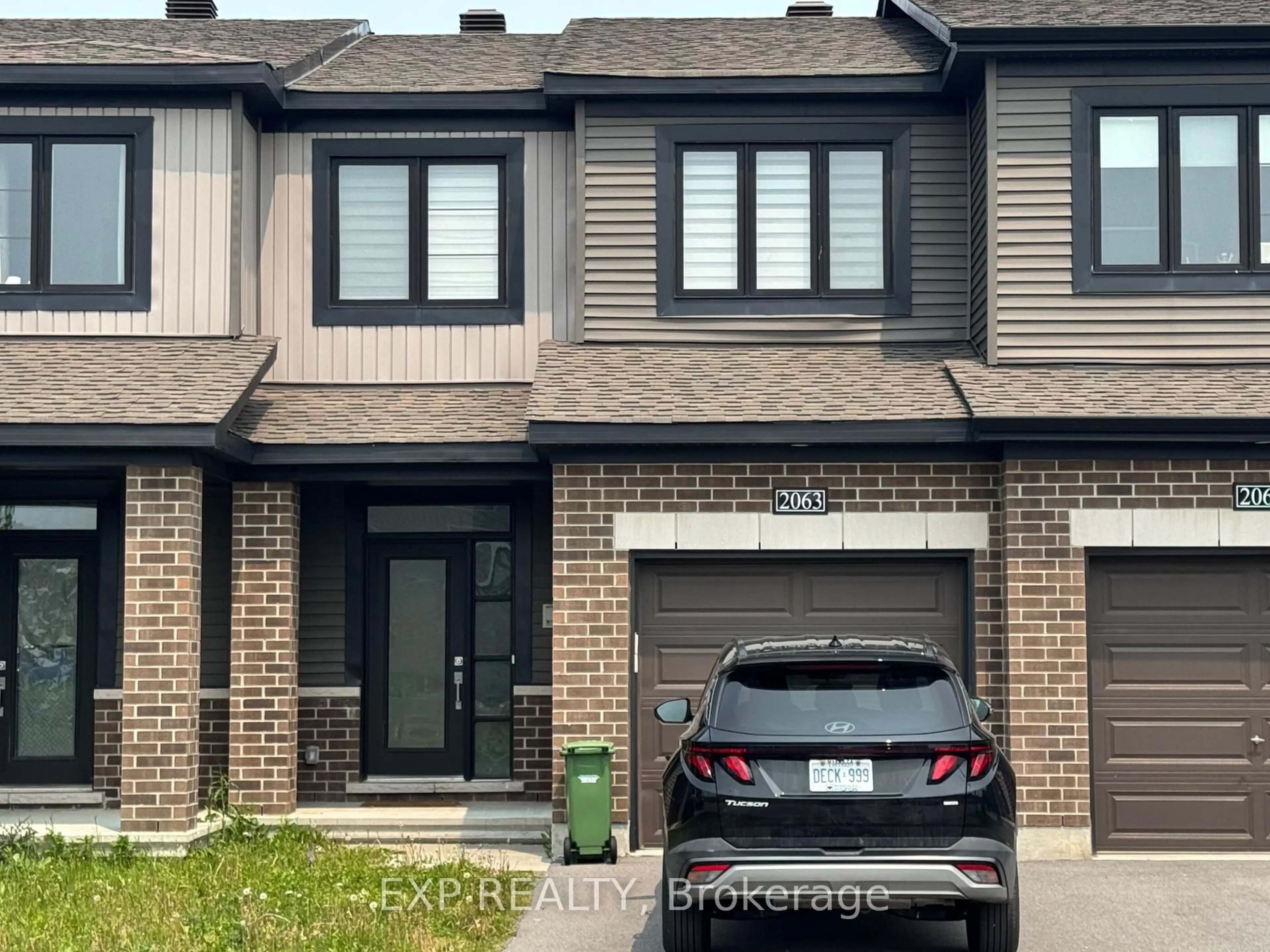 Home with brick exterior material, street for 2063 Caltra Cres, Ottawa Ontario K2J 6V4