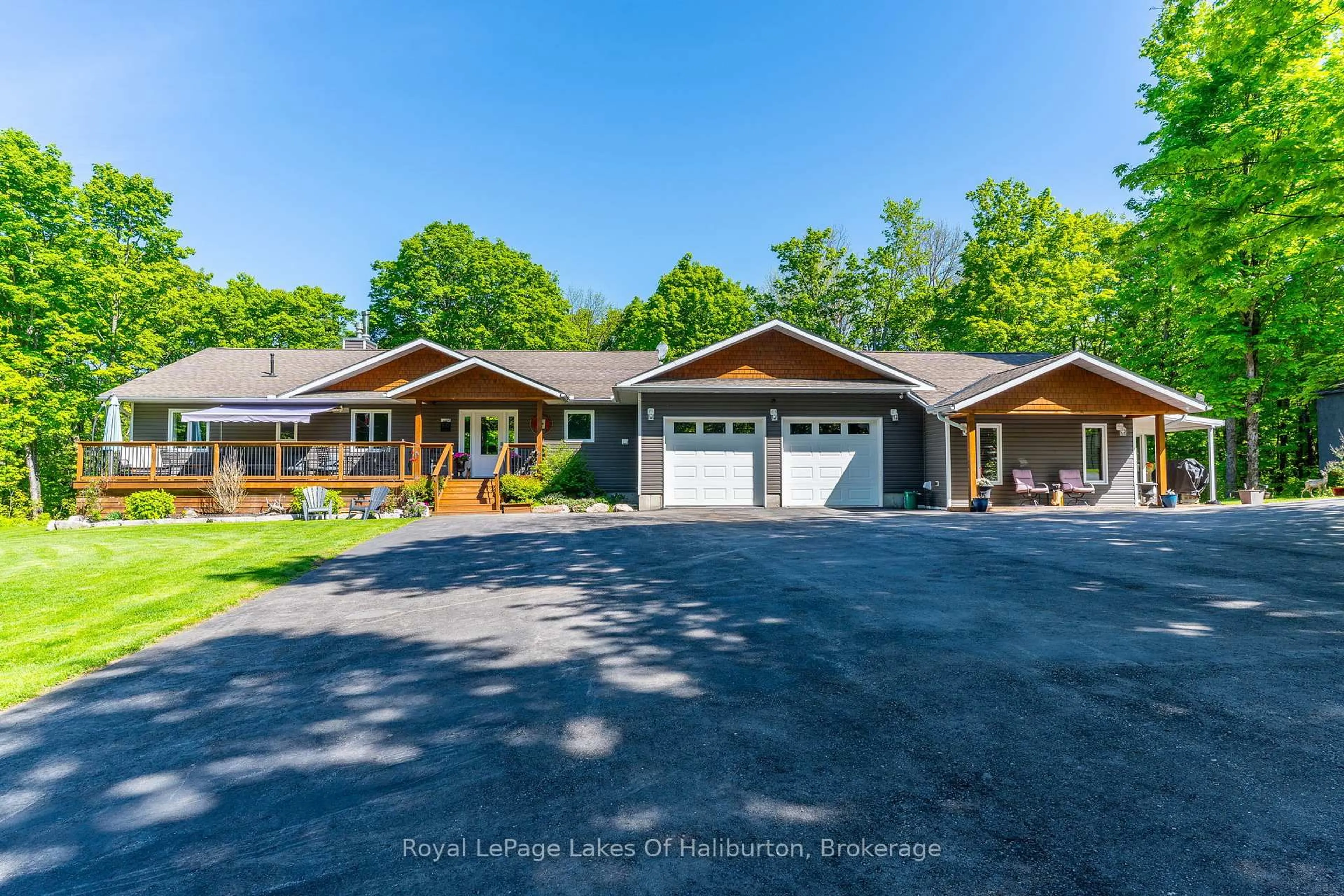 A pic from outside/outdoor area/front of a property/back of a property/a pic from drone, water/lake/river/ocean view for 1117 Burkes Rd, Dysart et al Ontario K0M 1S0
