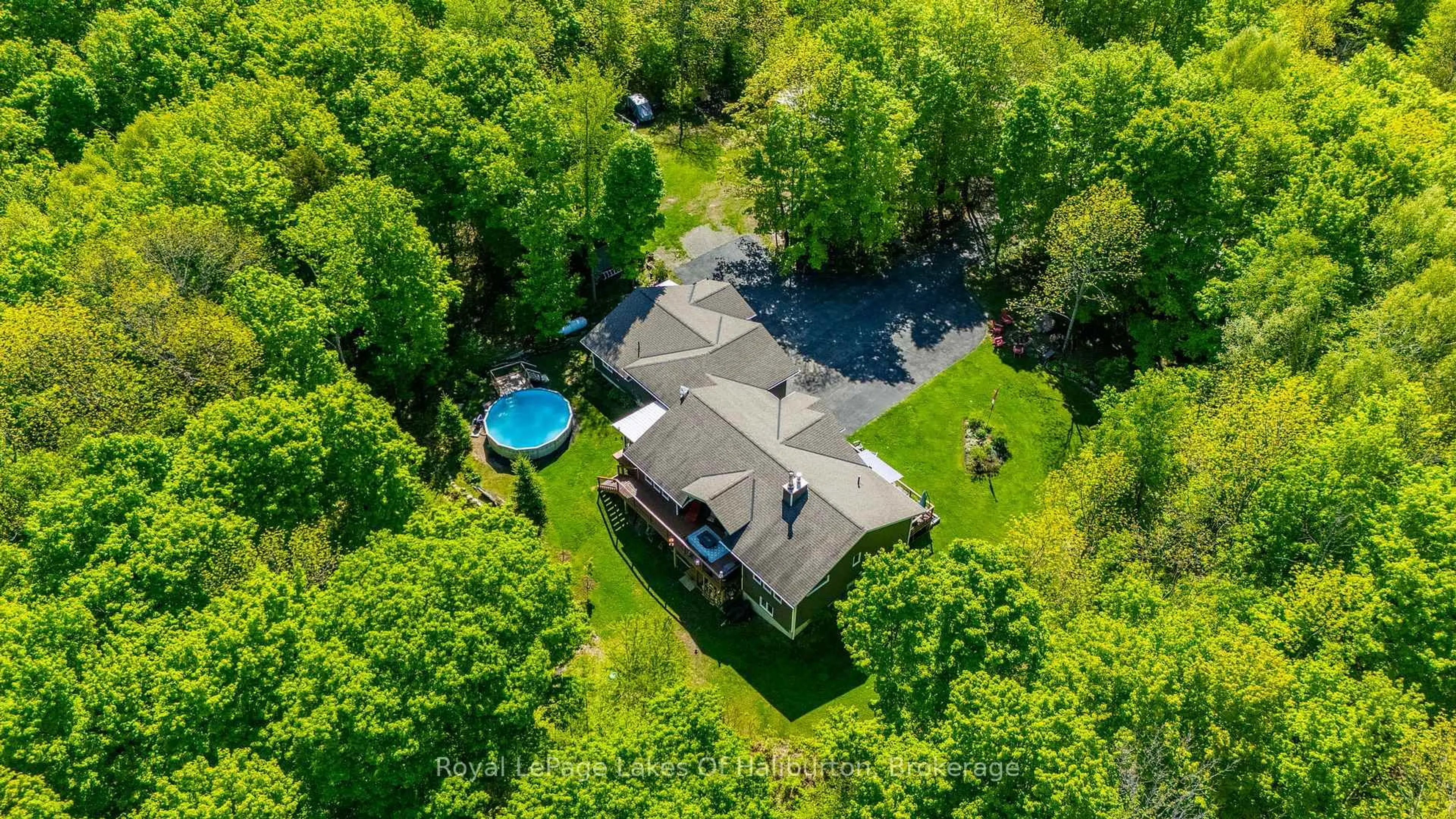 A pic from outside/outdoor area/front of a property/back of a property/a pic from drone, water/lake/river/ocean view for 1117 Burkes Rd, Dysart et al Ontario K0M 1S0