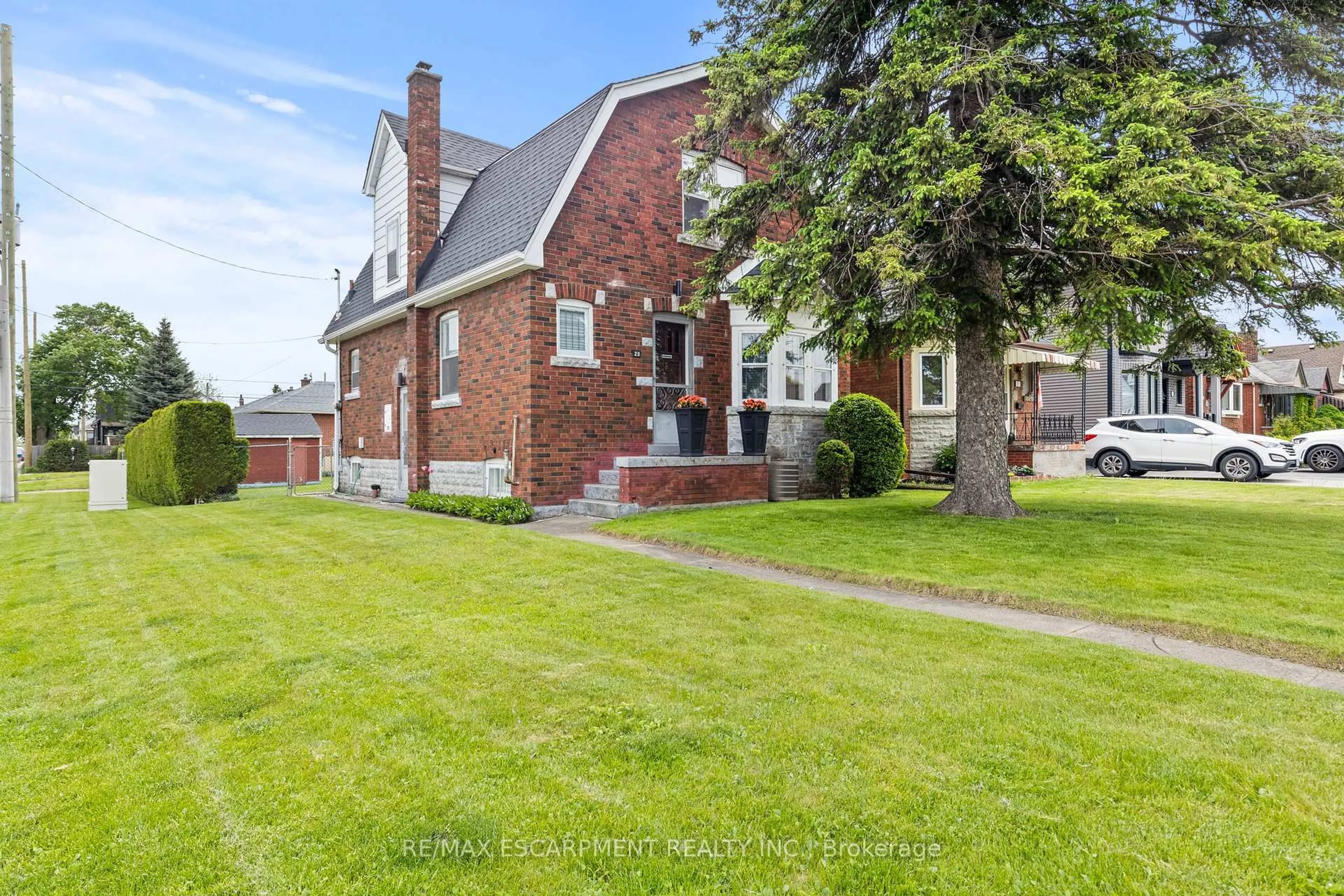 Home with brick exterior material, street for 29 Barons Ave, Hamilton Ontario L8K 2Y1