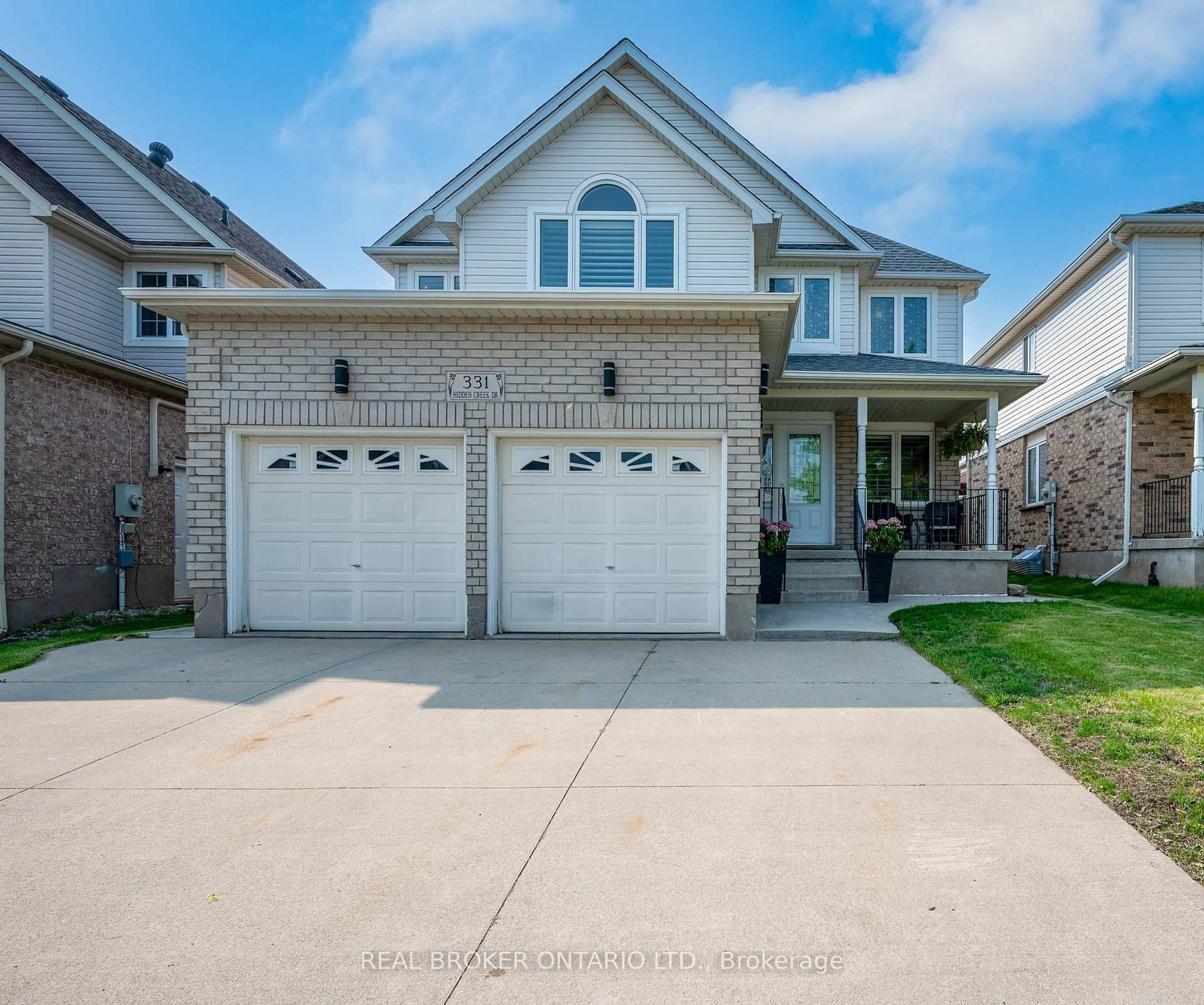 Home with brick exterior material, street for 331 Hidden Creek Dr, Kitchener Ontario N2N 3N3